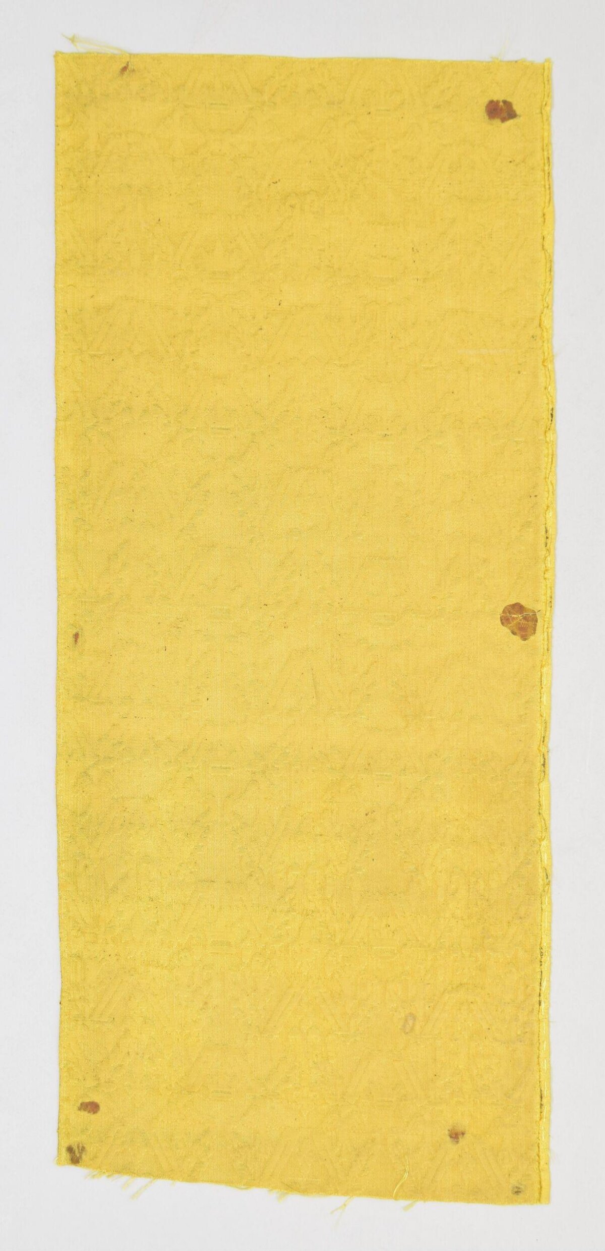 Aged Yellow Textile Fragment