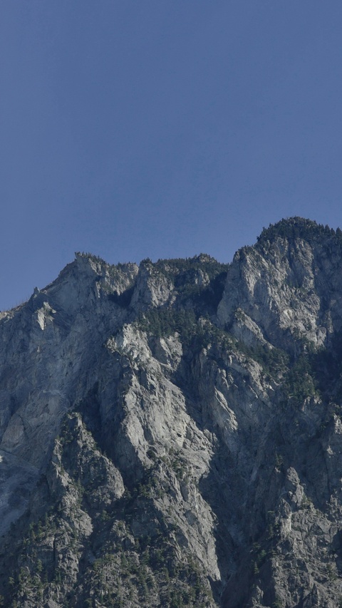 Rocky Mountain Peak Under Clear Sky