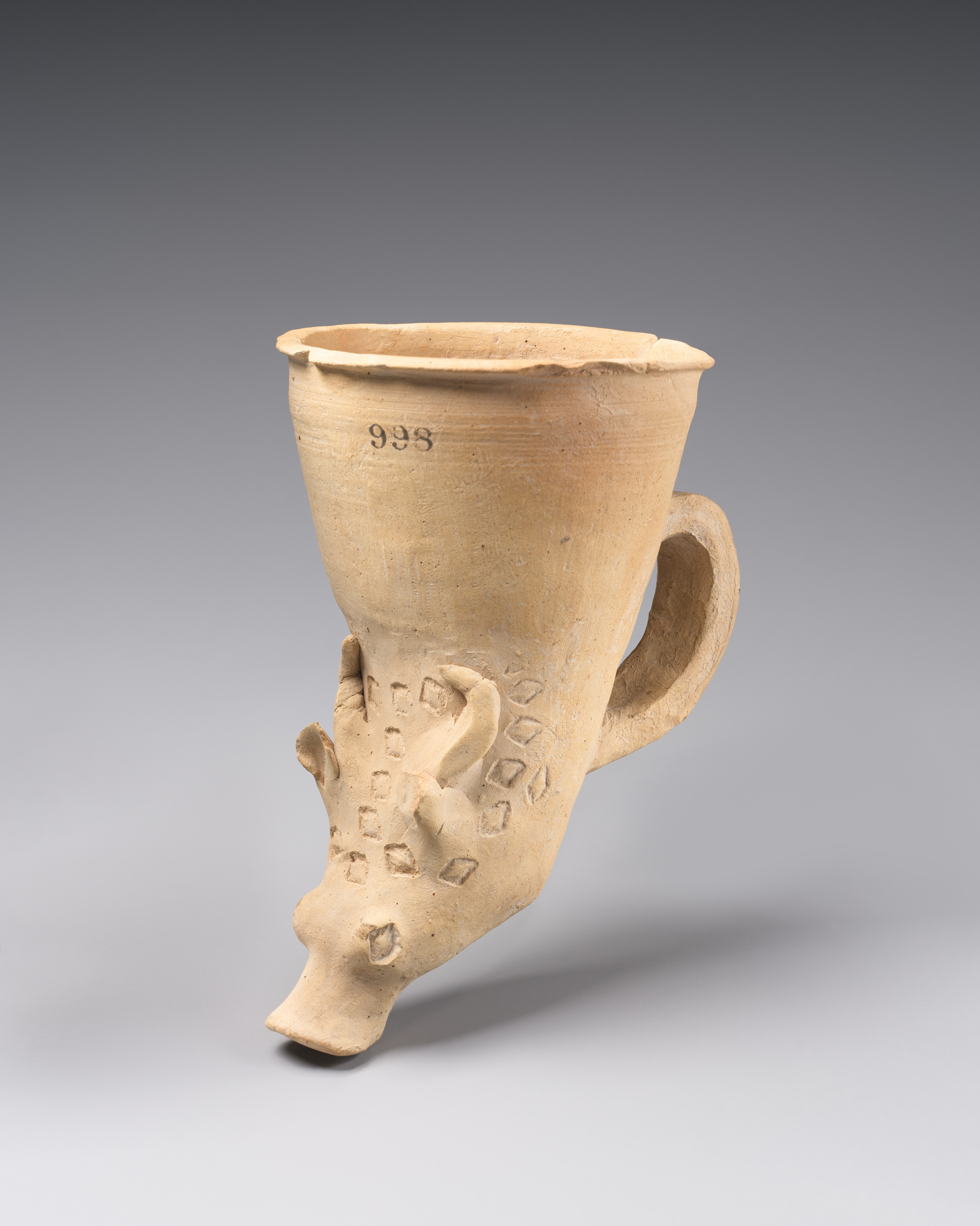 Ancient pottery beast-headed cup
