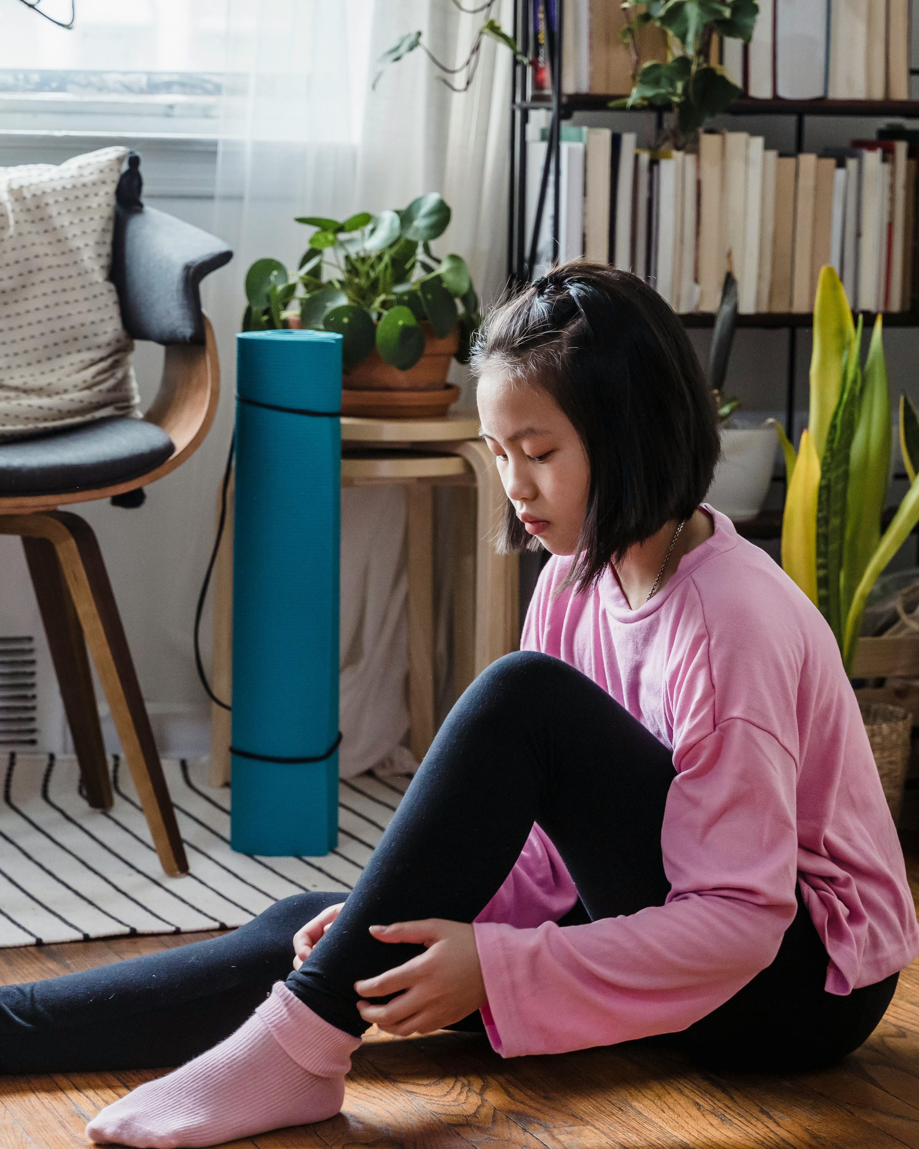 Girl Preparing for Yoga at Home