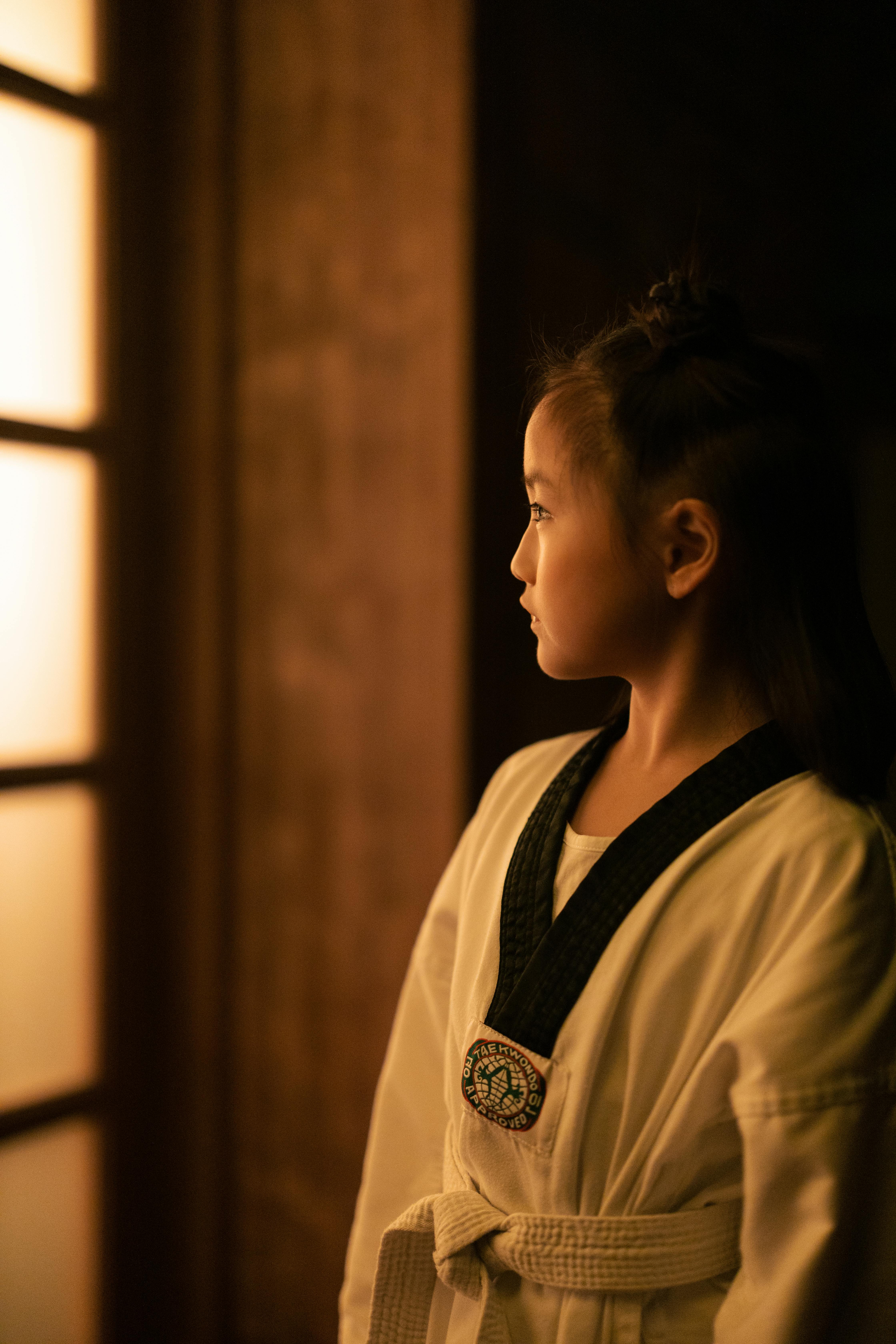 Young Girl in Taekwondo Uniform