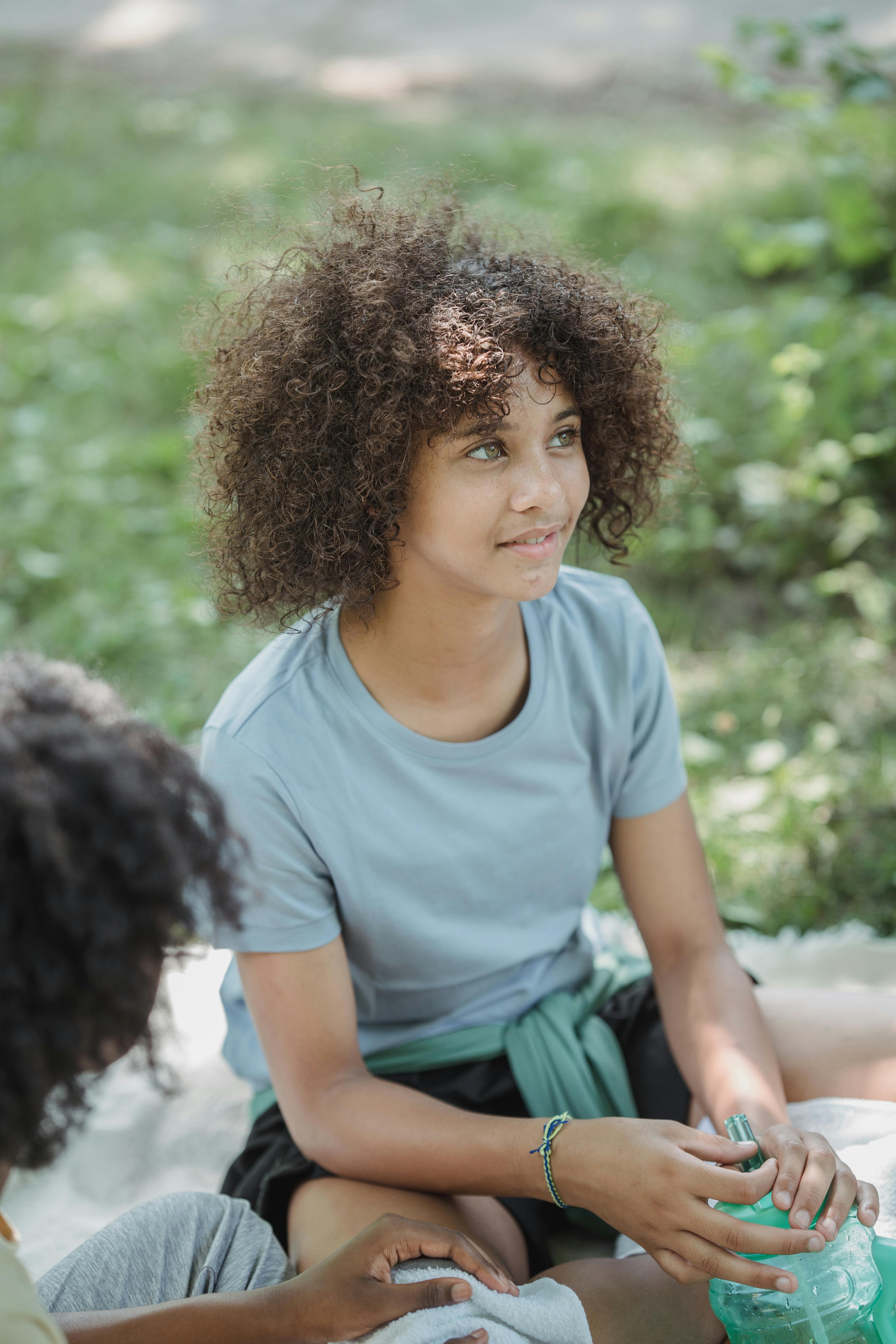 Teen Relaxing At Outdoor Picnic