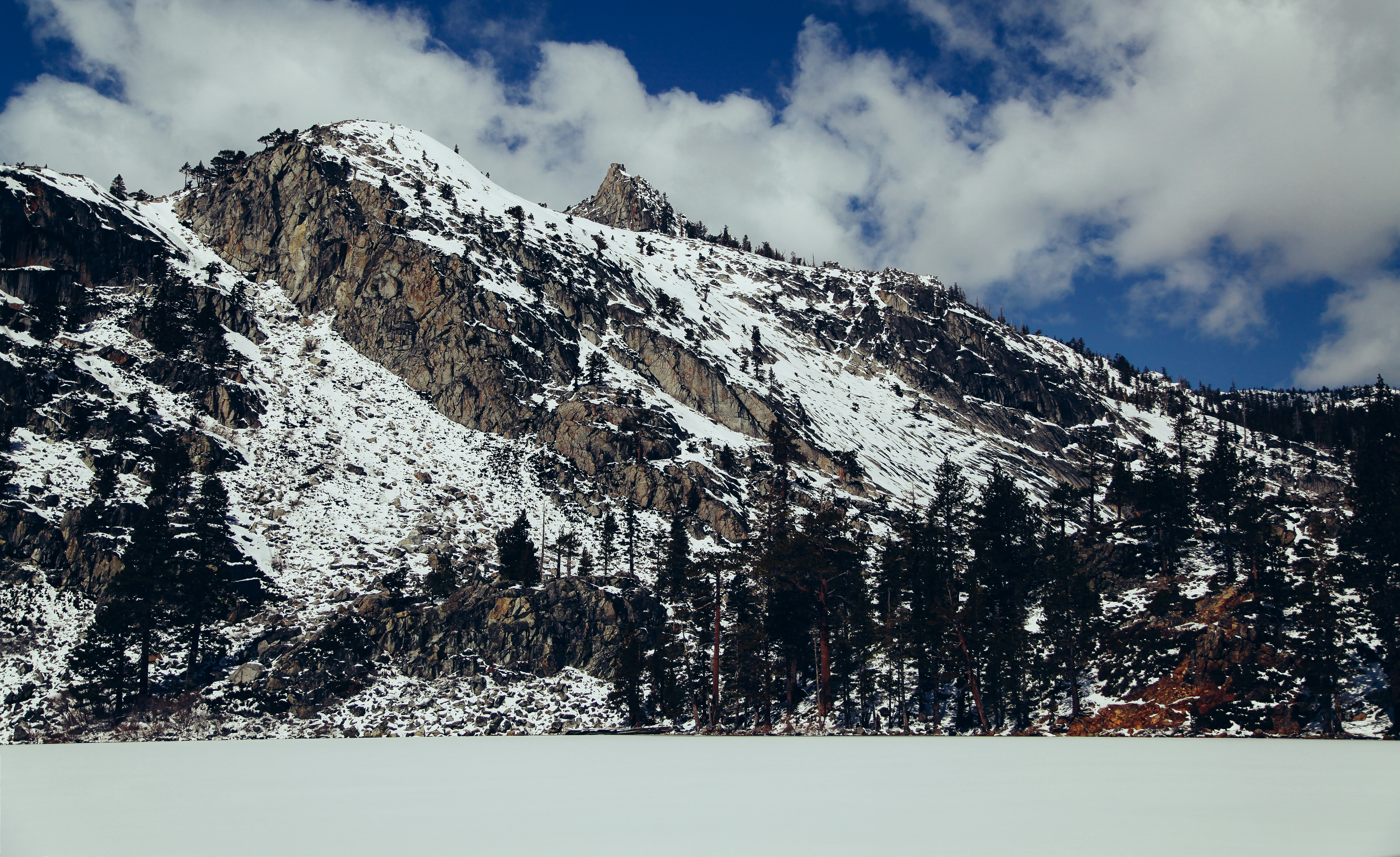 Snowy Mountain Above Frozen Lake