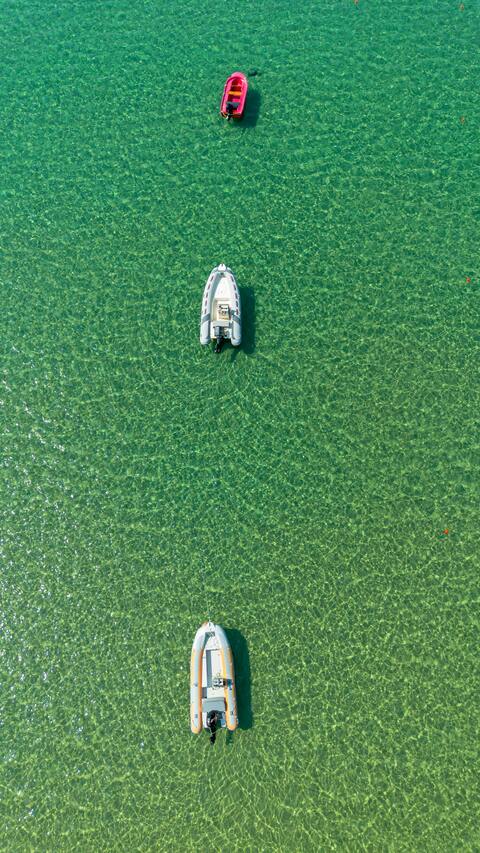 Aerial View of Boats on Clear Sea