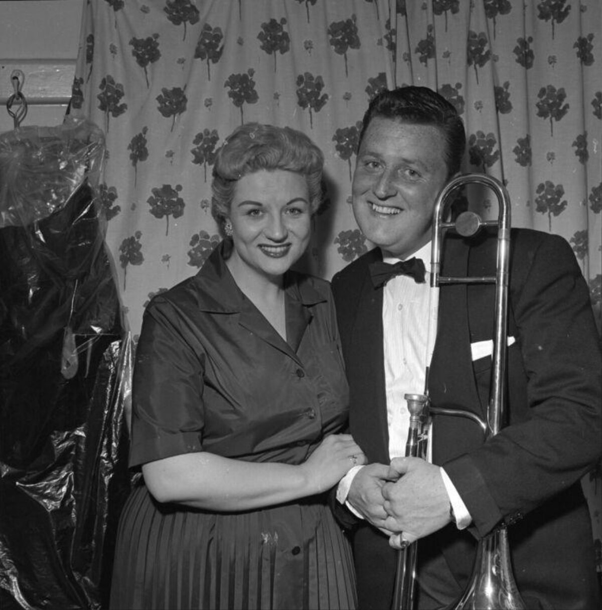 Smiling Couple With Trombone Portrait