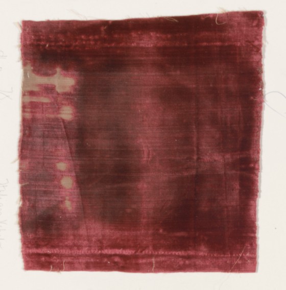 Damaged Red Velvet Fabric Swatch
