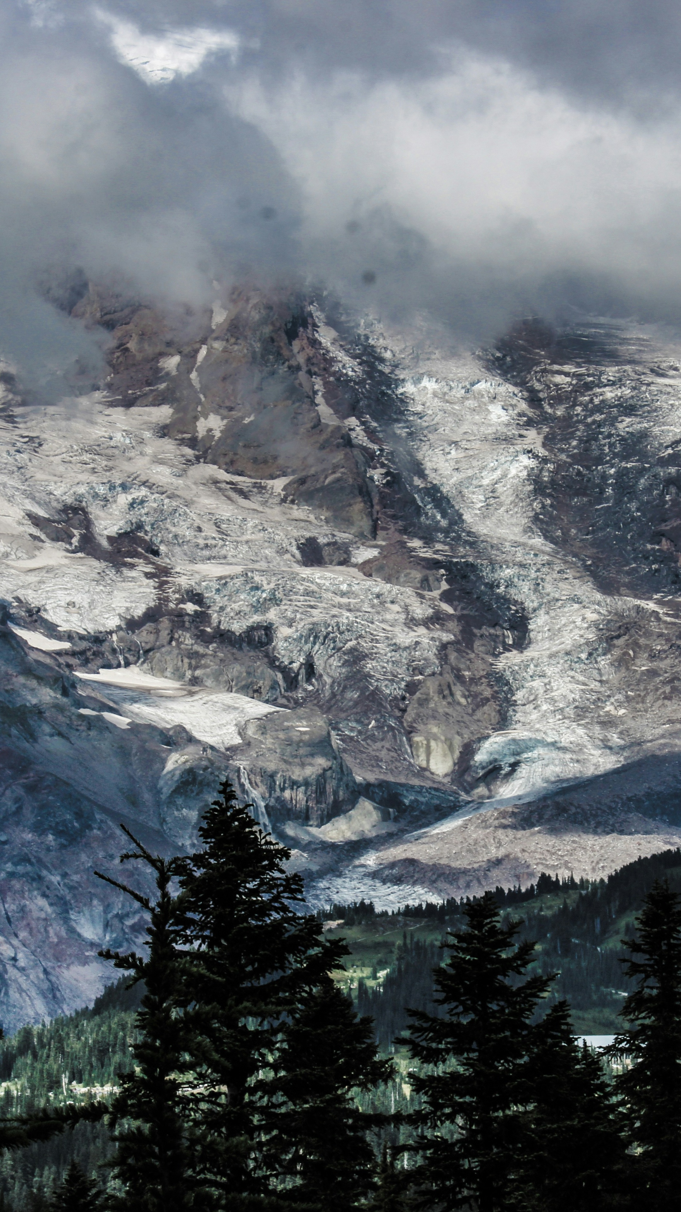 Cloud-Capped Glaciated Mountain