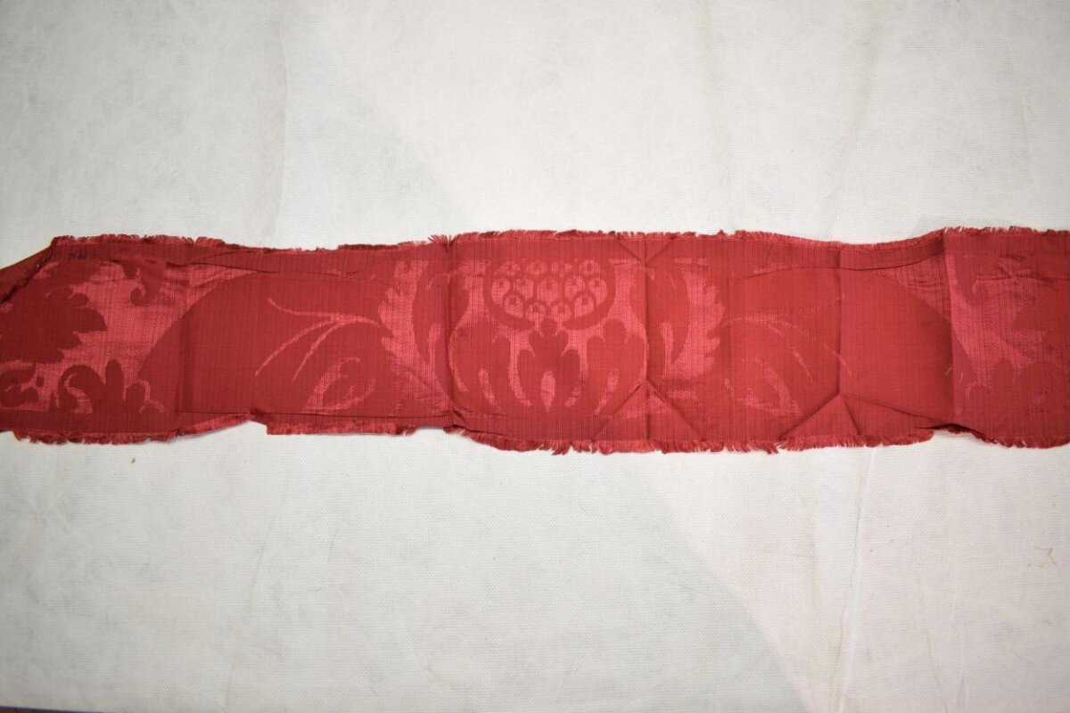 Red Patterned Fabric Fragment