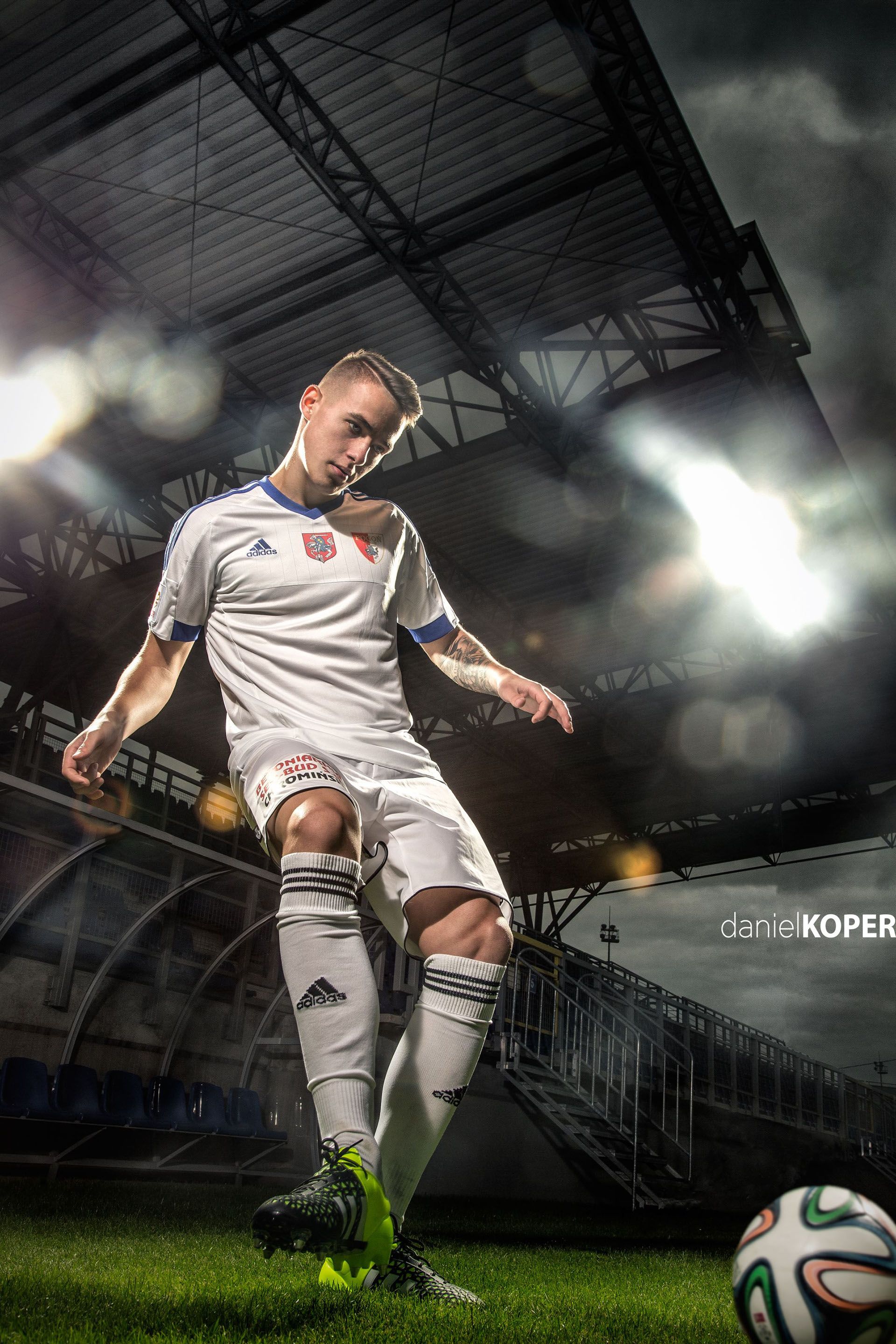 Soccer Player Posing in Stadium