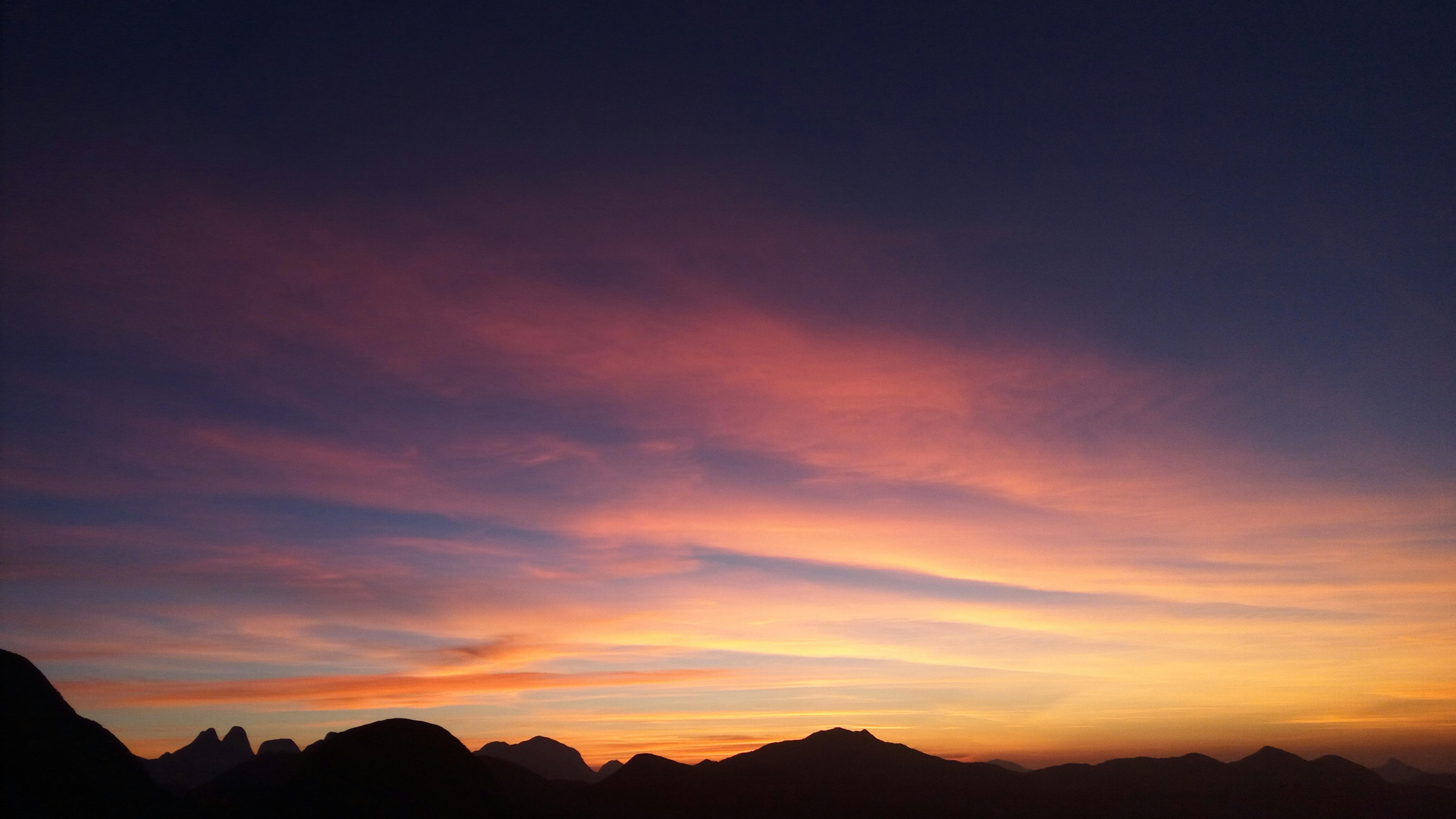 Silhouetted Mountains at Sunset