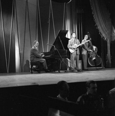Jazz Trio Performing on Stage