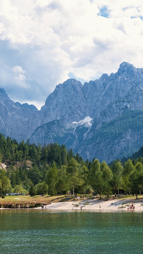 Lake Beach with Mountain Backdrop