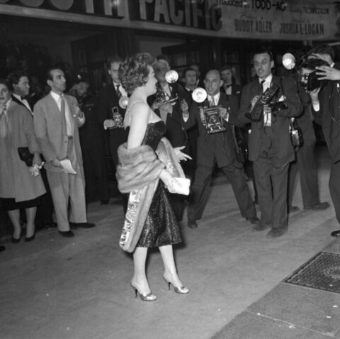 Actress Surrounded By Paparazzi At Premiere