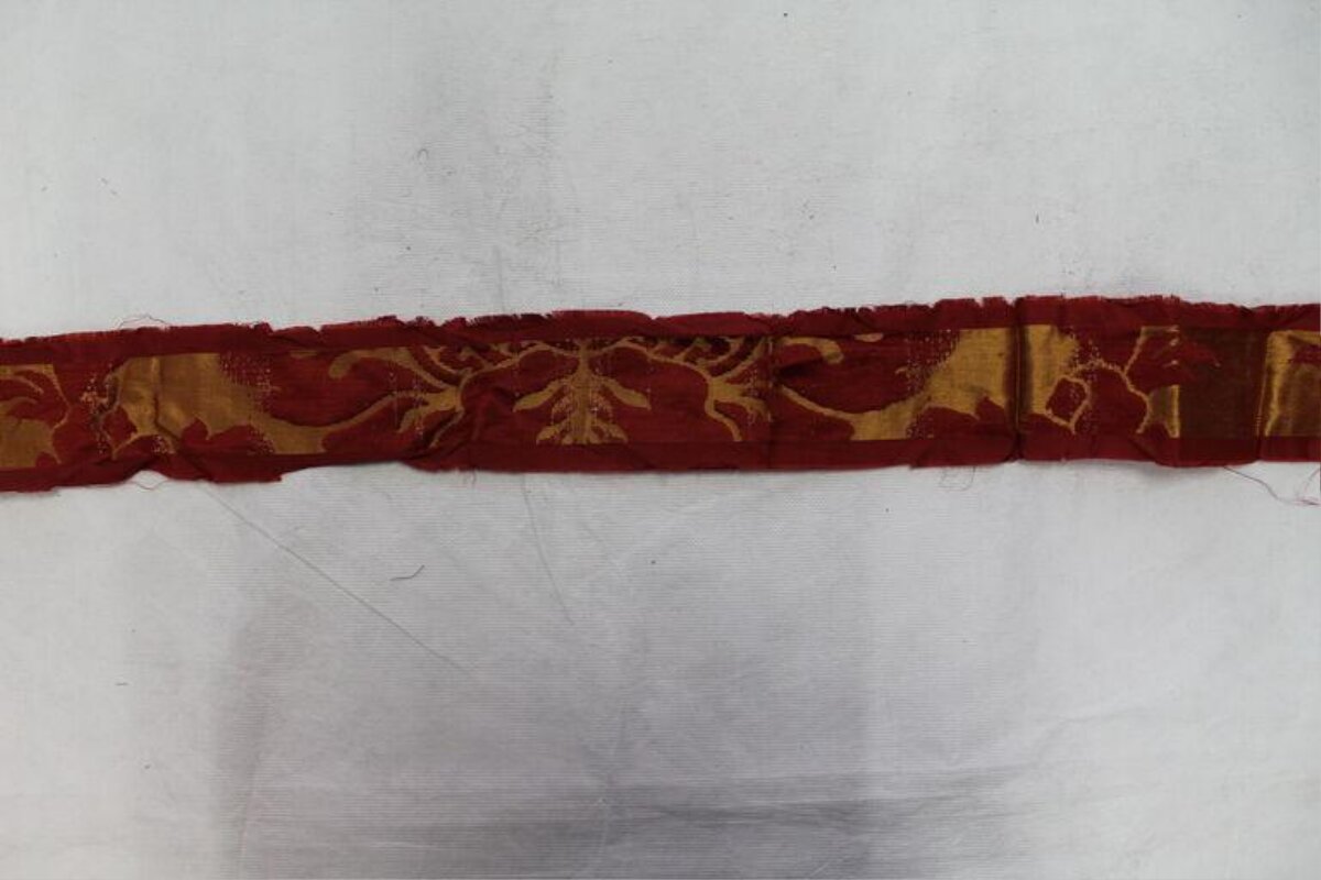Ancient Red Patterned Fabric Fragment
