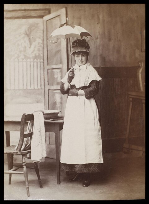 Vintage Studio Portrait of Woman With Umbrella