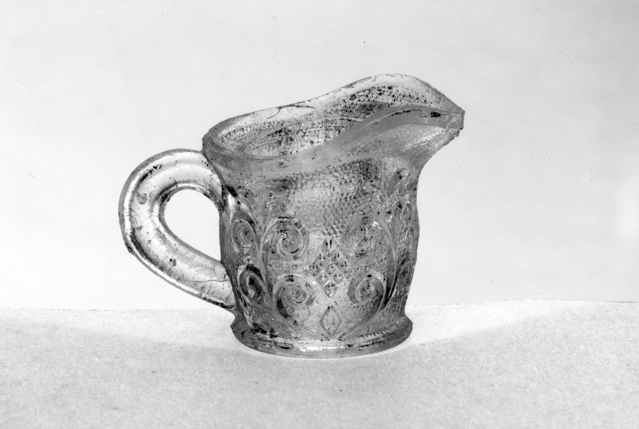 Antique Patterned Glass Pitcher