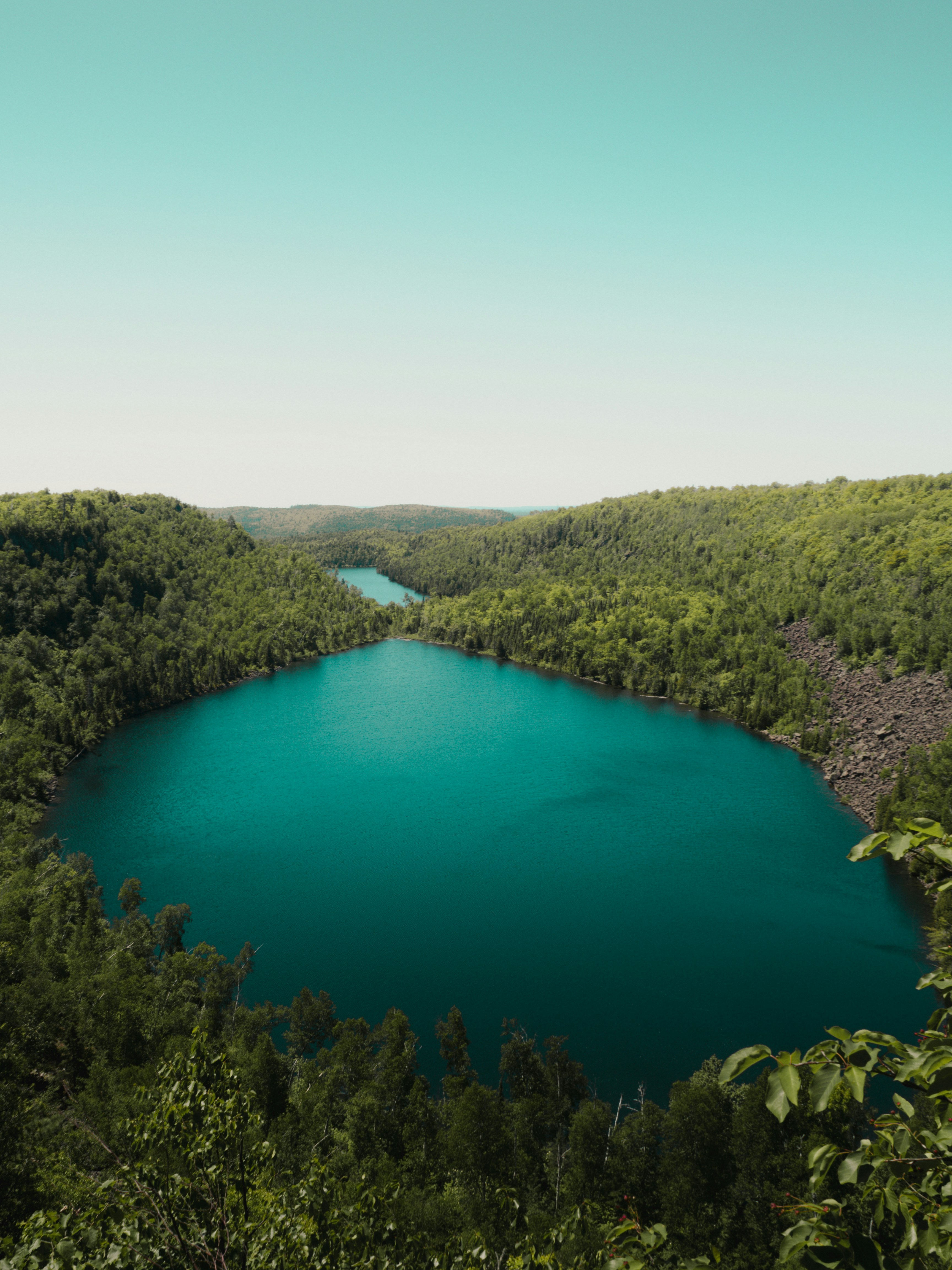 Turquoise Lake in Forest Gorge