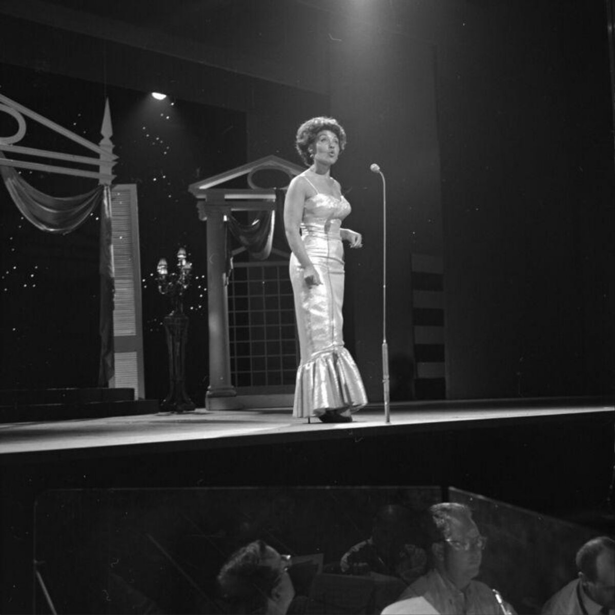 Female Singer Performing on Stage