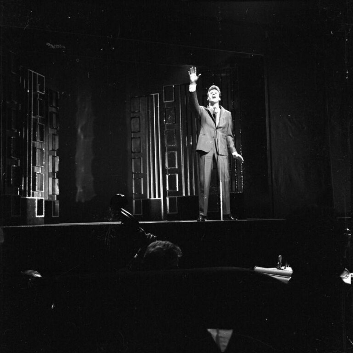 Male Performer Performing on Stage