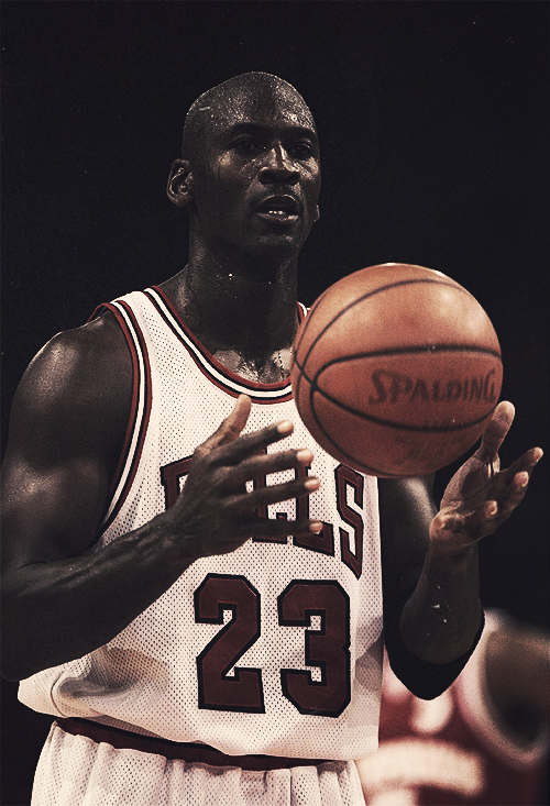 Michael Jordan Holding Basketball