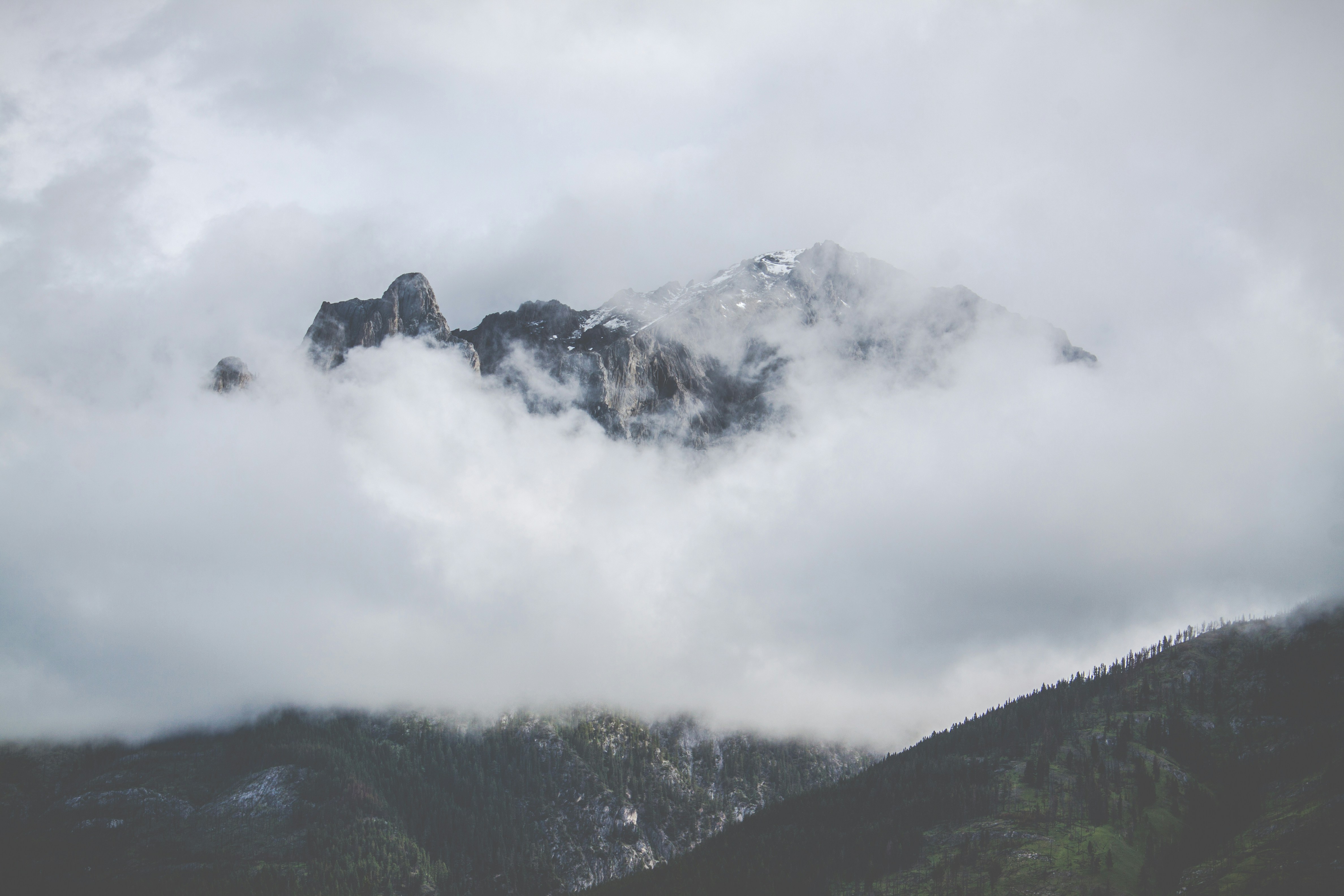 Misty Clouds Over Mountain Peaks