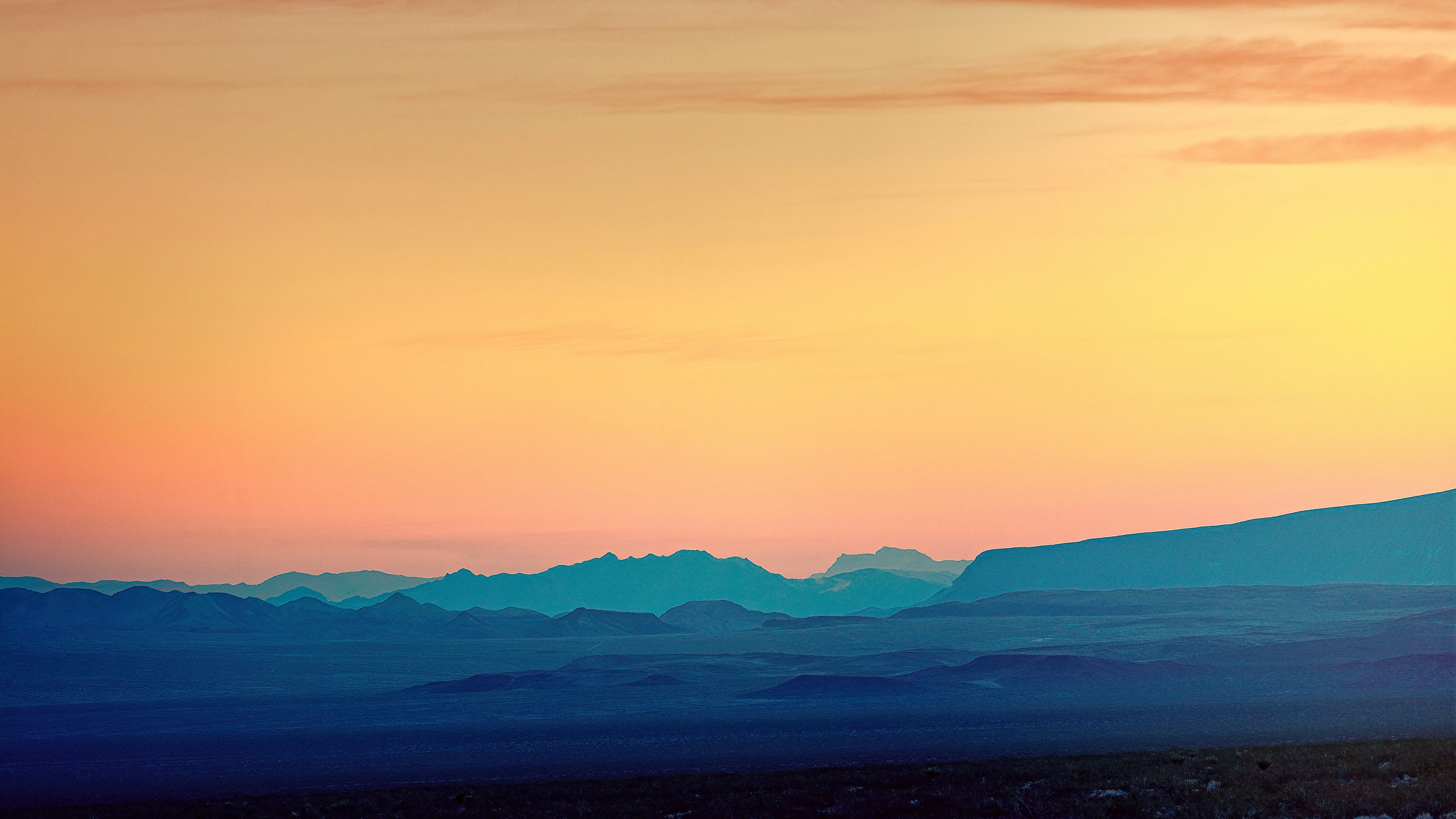 Sunset Over Layered Mountains
