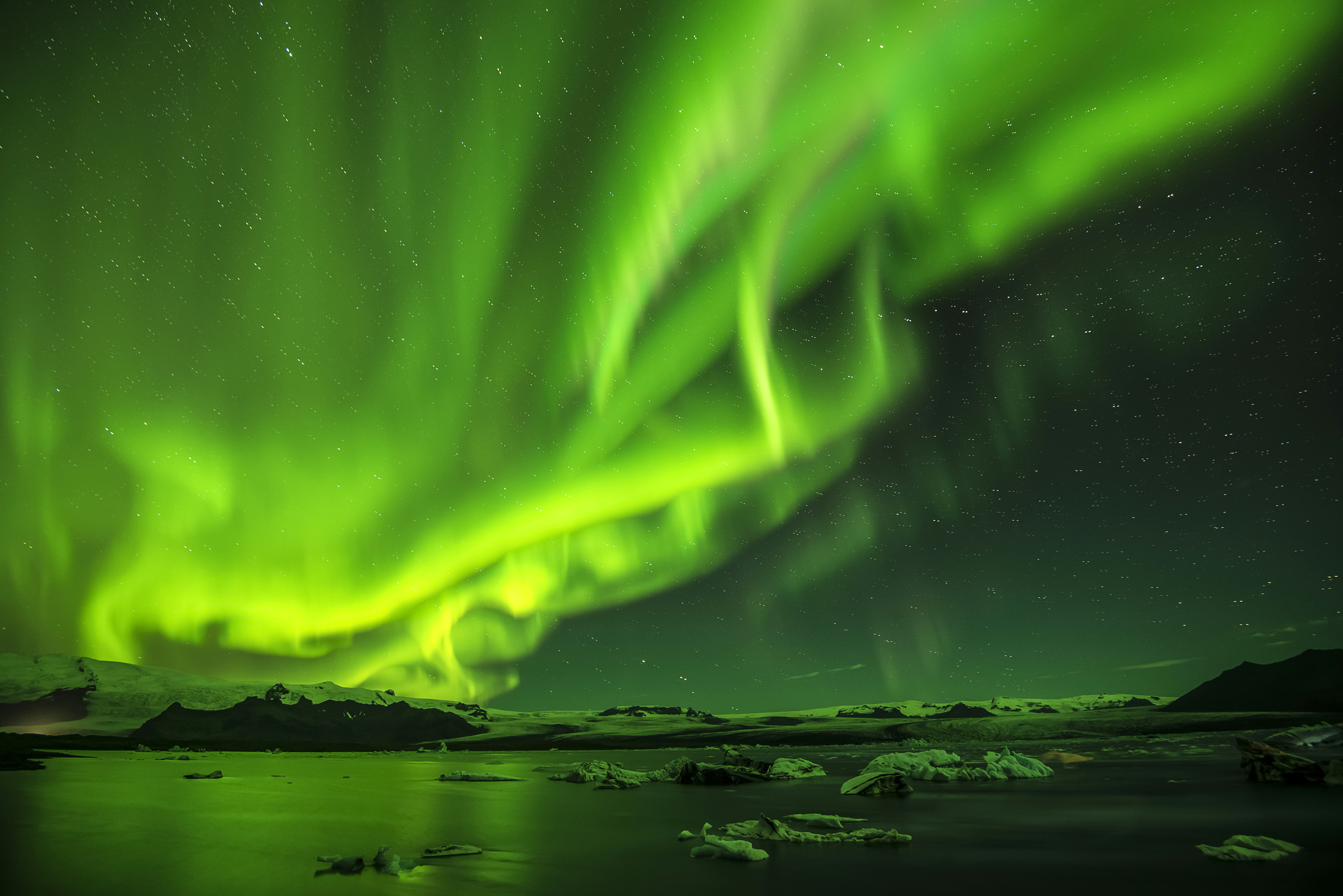 Green Aurora Over Ice Lagoon