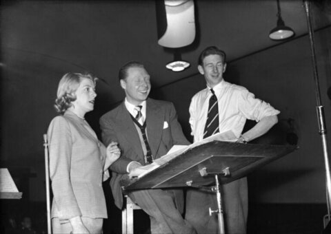 Three People Rehearsing at Music Stand