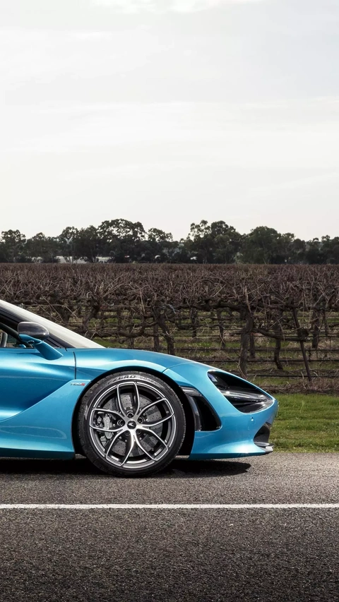 Blue McLaren Sports Car by Vineyard