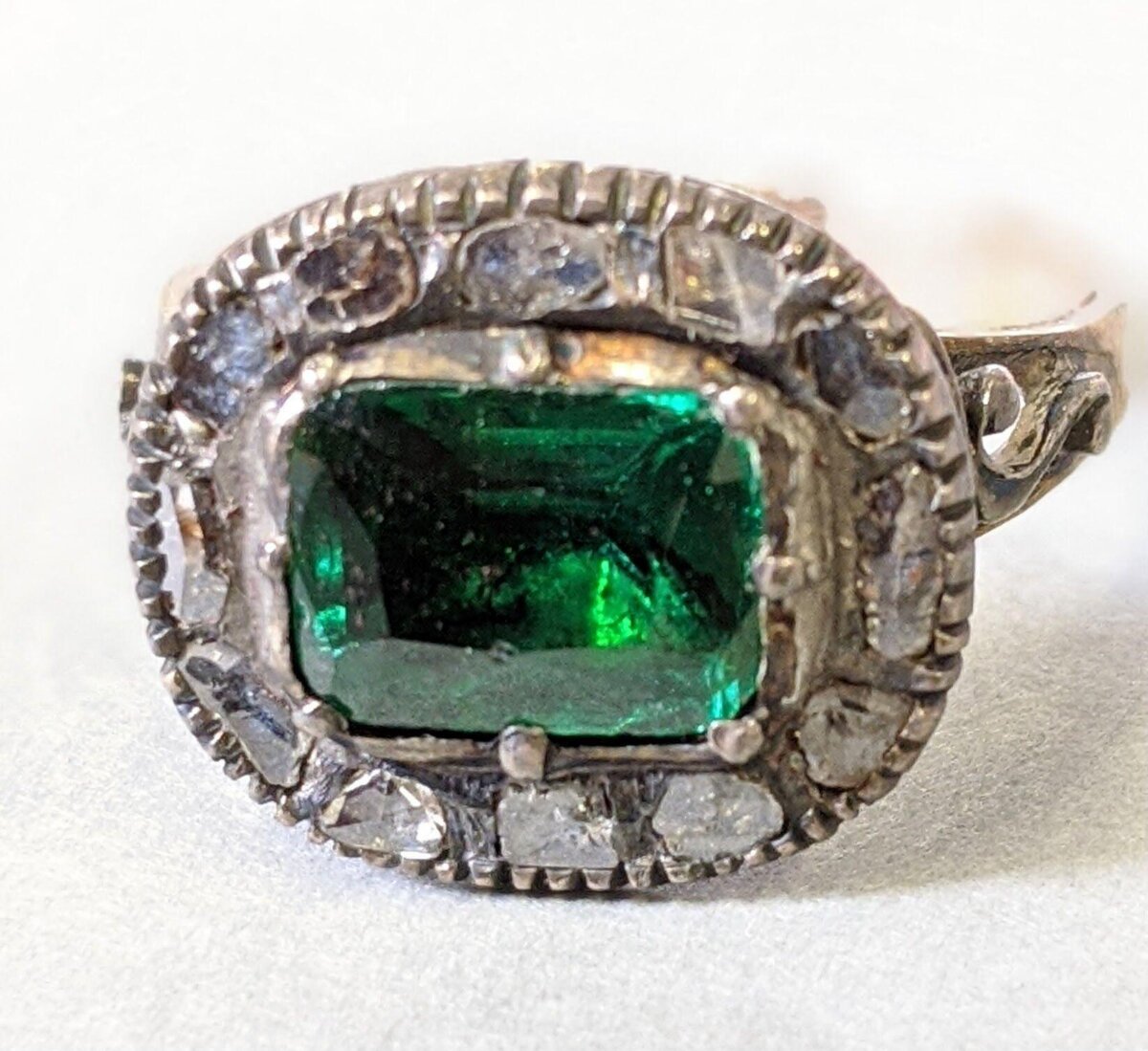 Antique Emerald Diamond Halo Ring