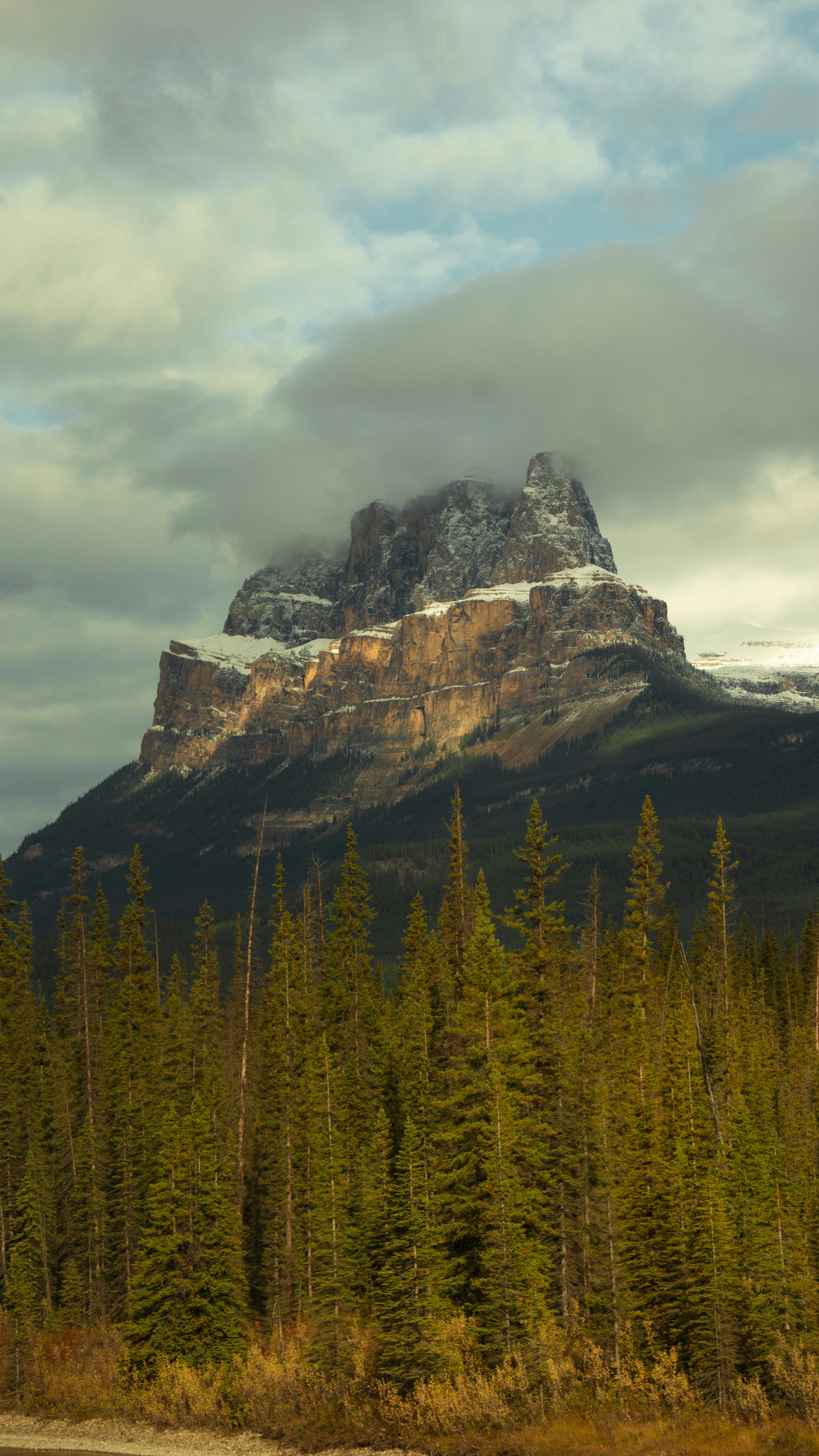 Cloud-capped Snowy Mountain Landscape