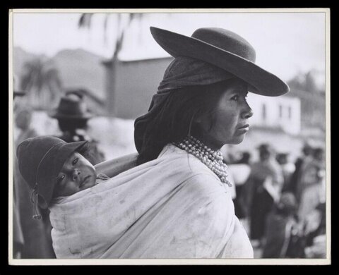 Indigenous Woman Carrying Child