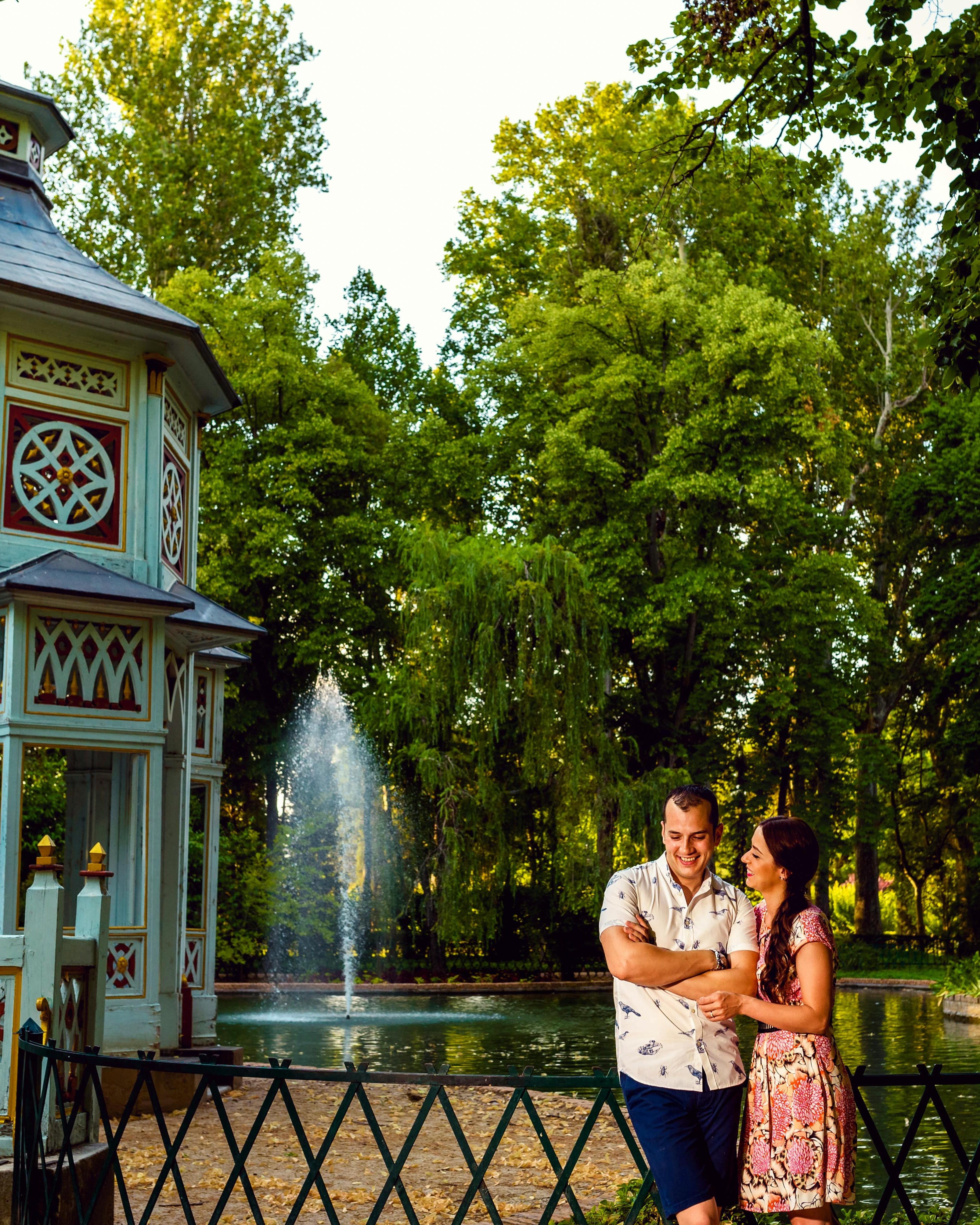 Couple Standing by Park Pond