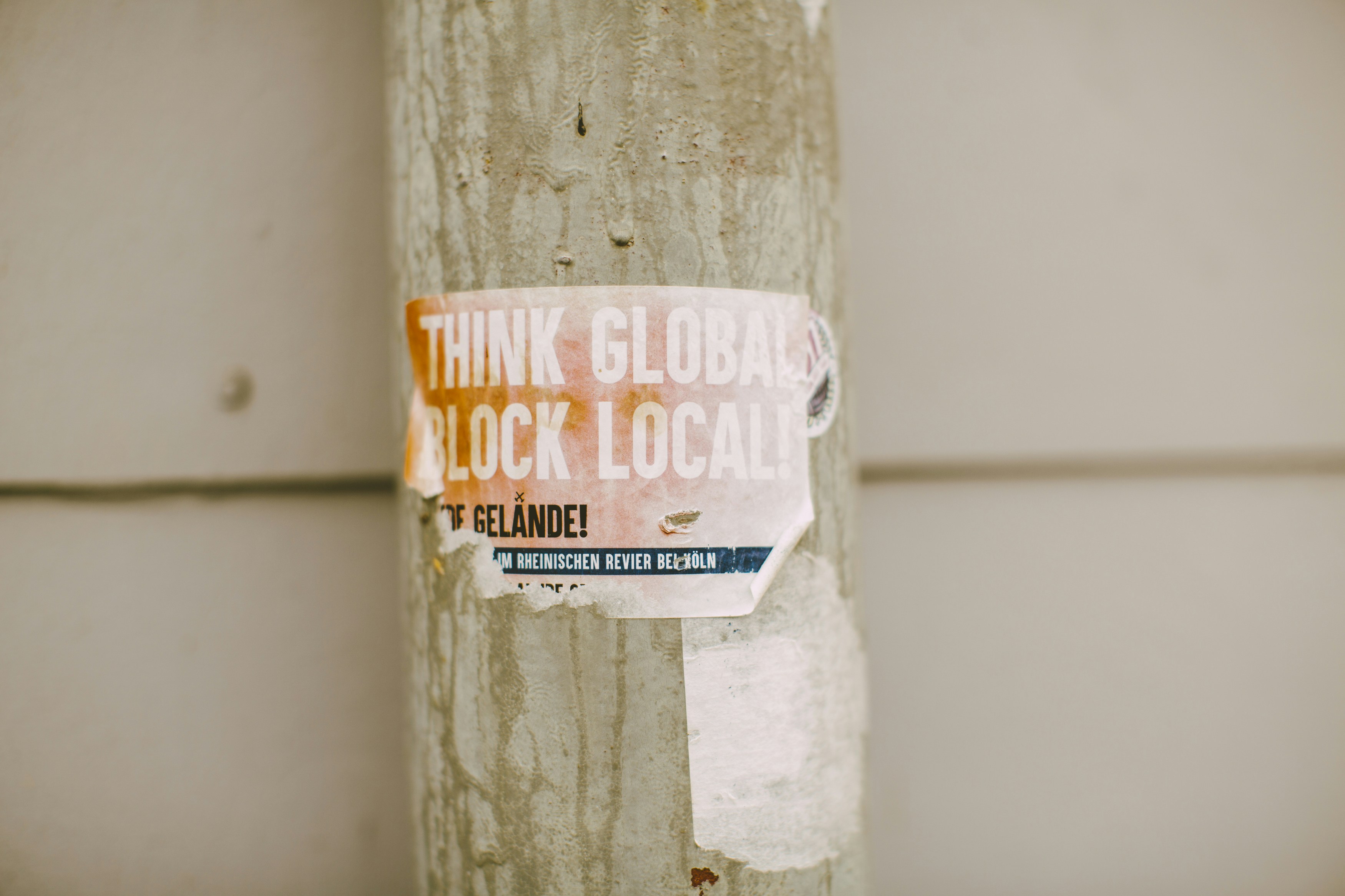 Activist Protest Sticker on Pole