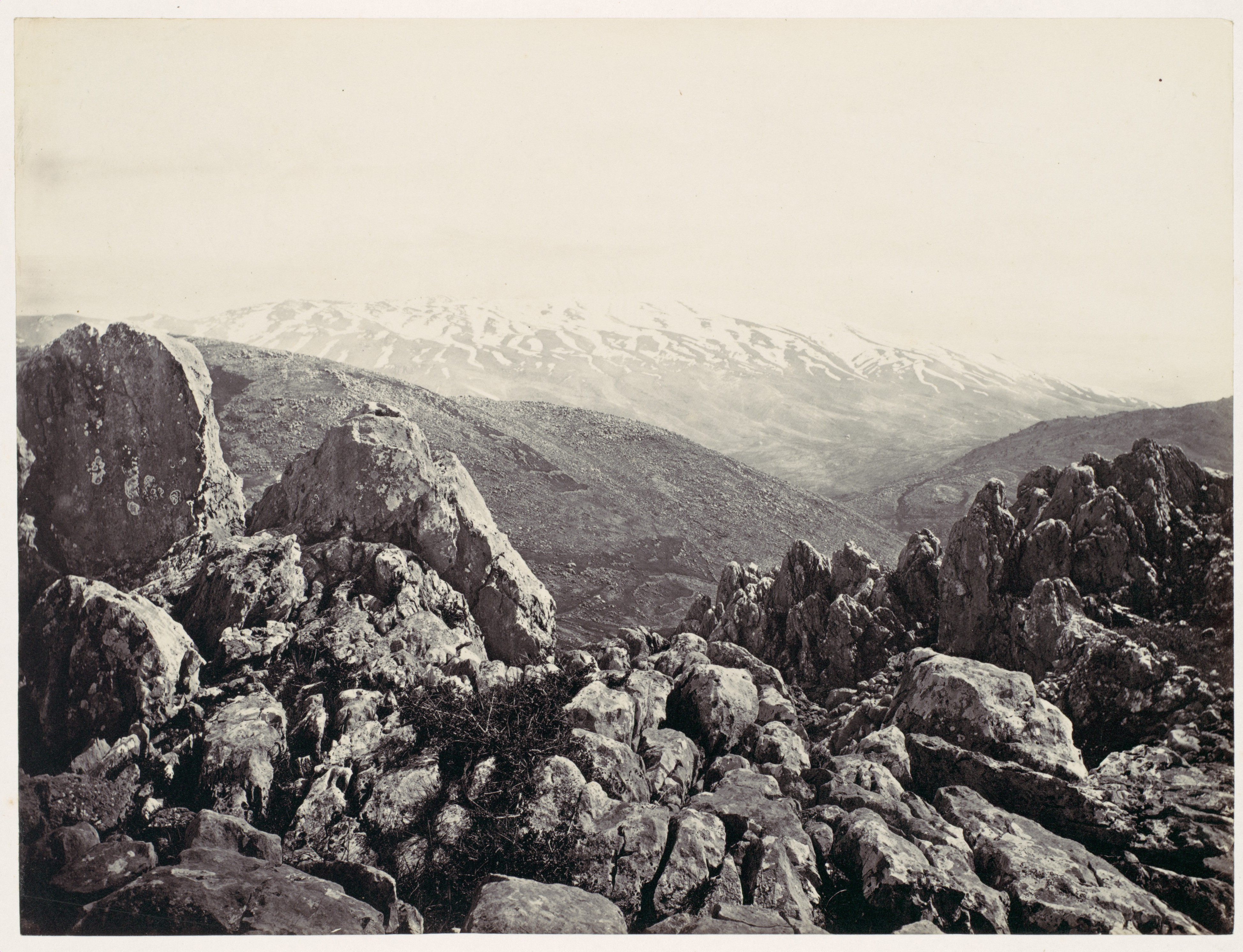 Rocky Landscape with Snowy Mountain