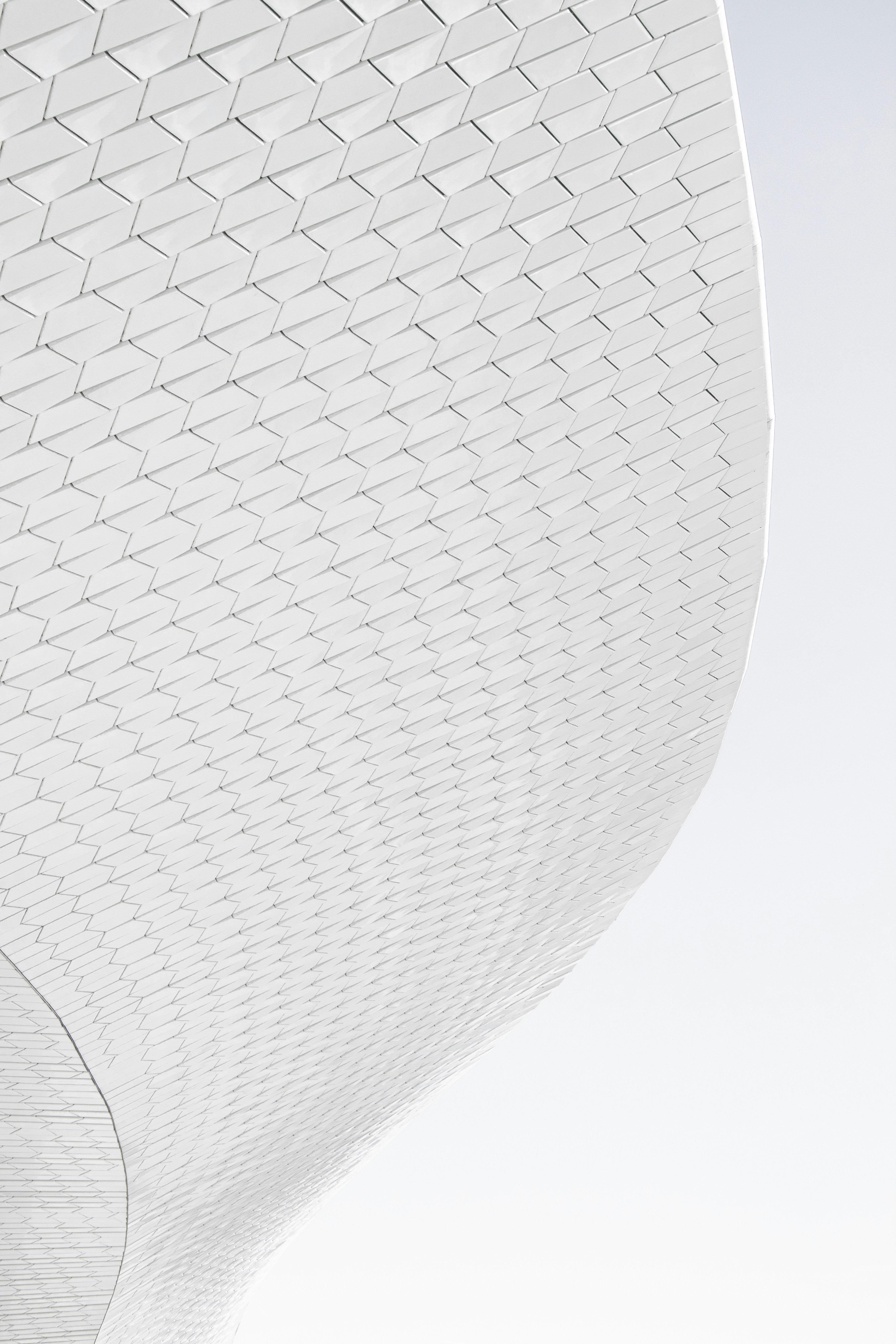 Curved White Tiled Building Facade