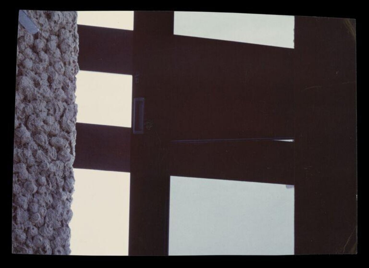 Window Grille Beside Textured Wall