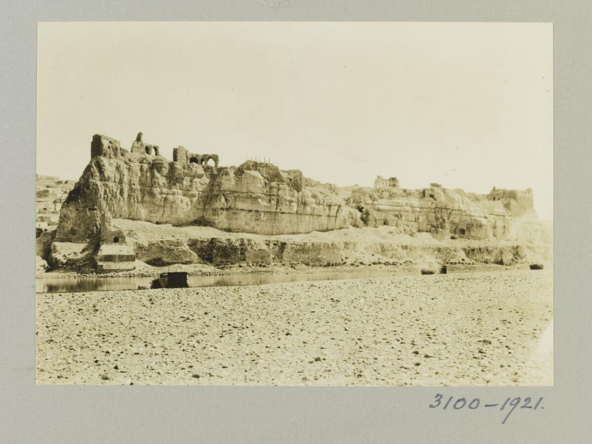 Cliffside Ancient Ruins by River
