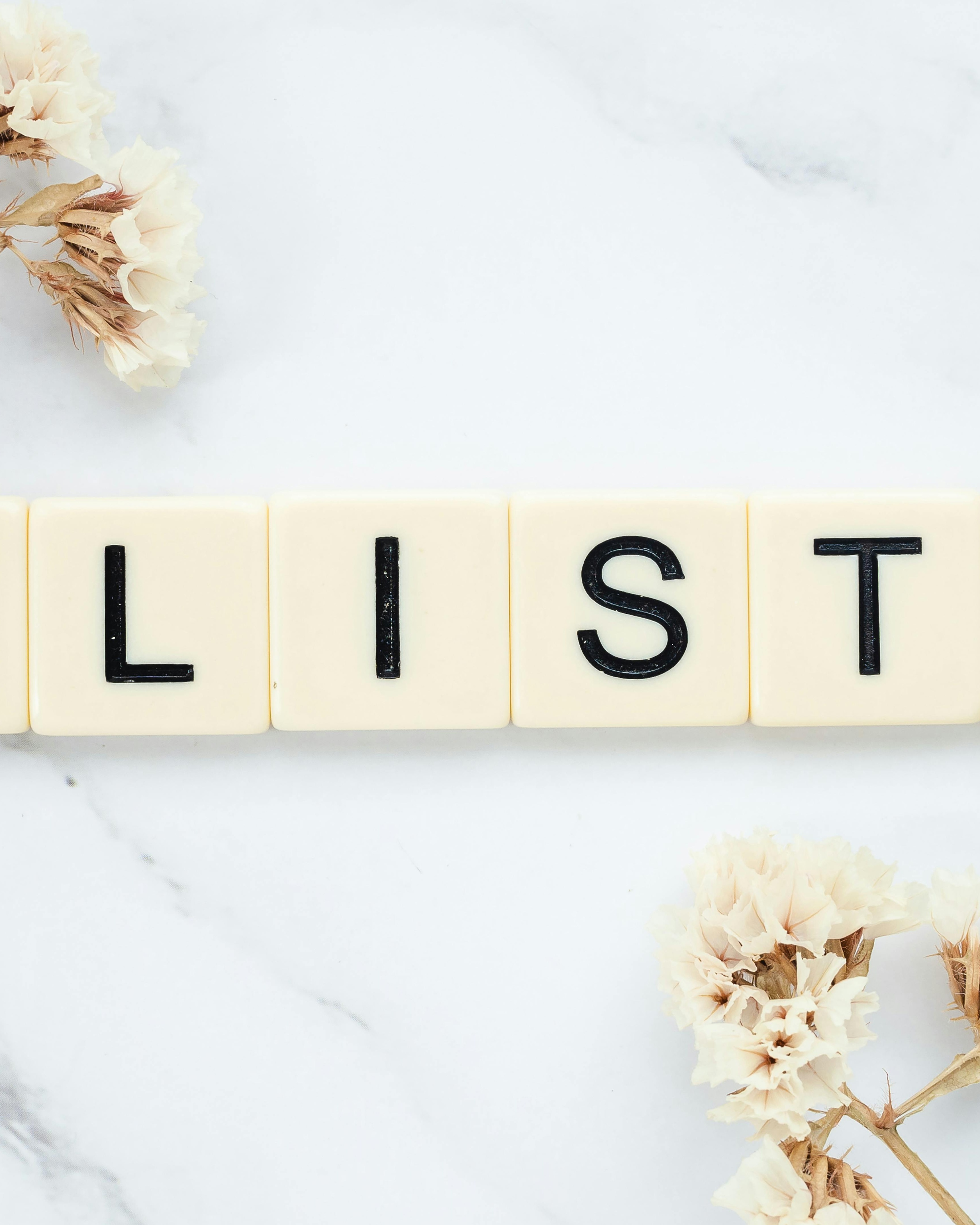 Letter Tiles Spelling LIST on Marble
