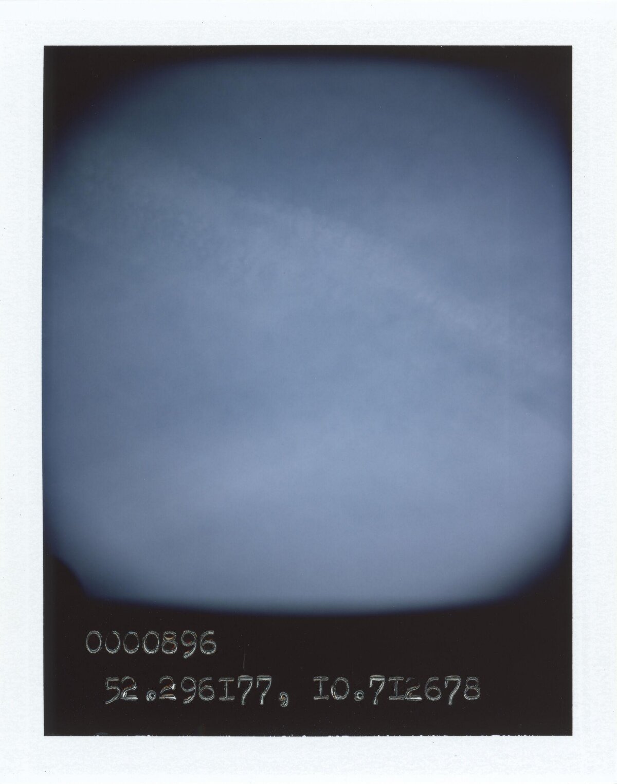 Overcast Blue Sky With Coordinates