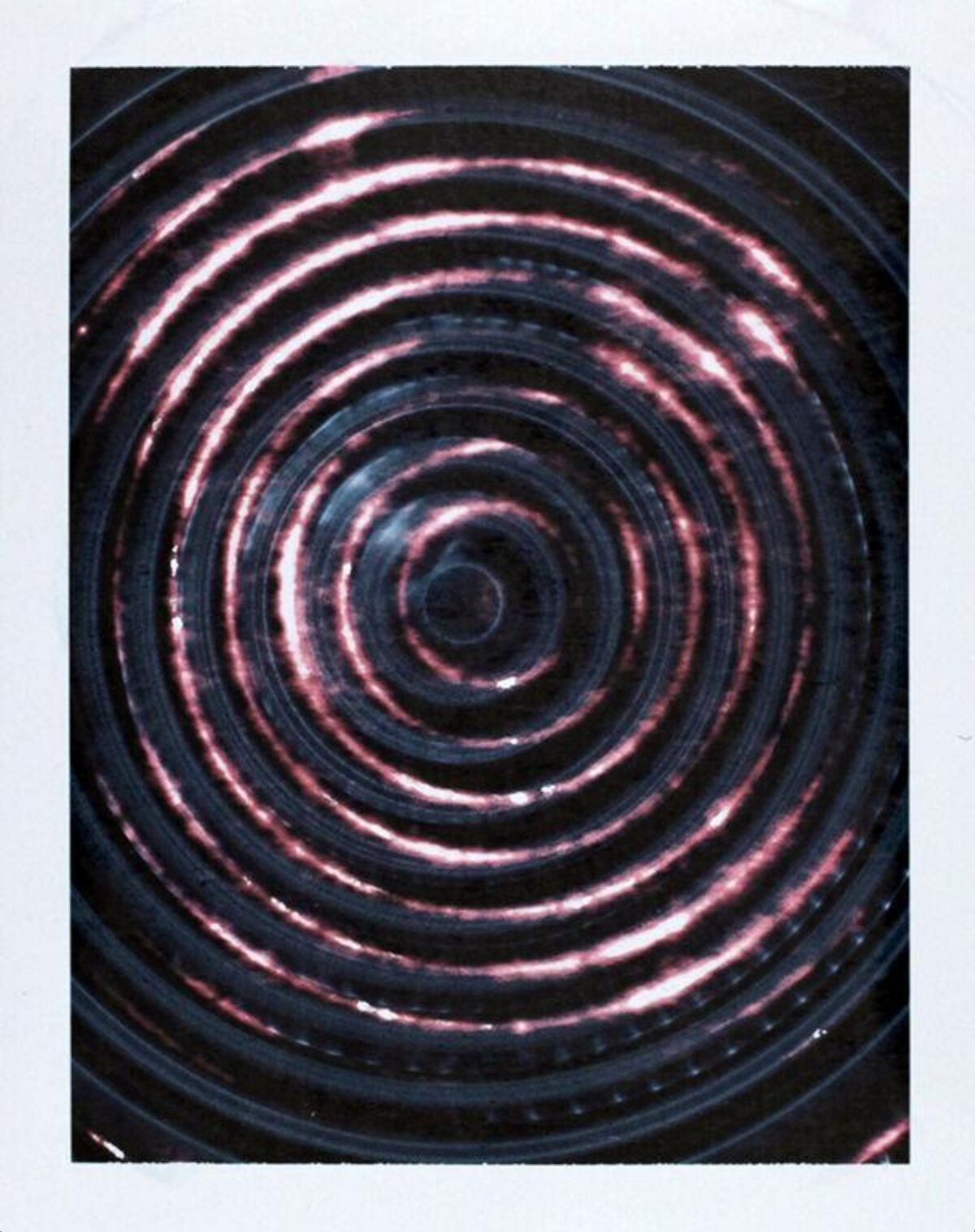 Concentric Pink Spiral Ripples