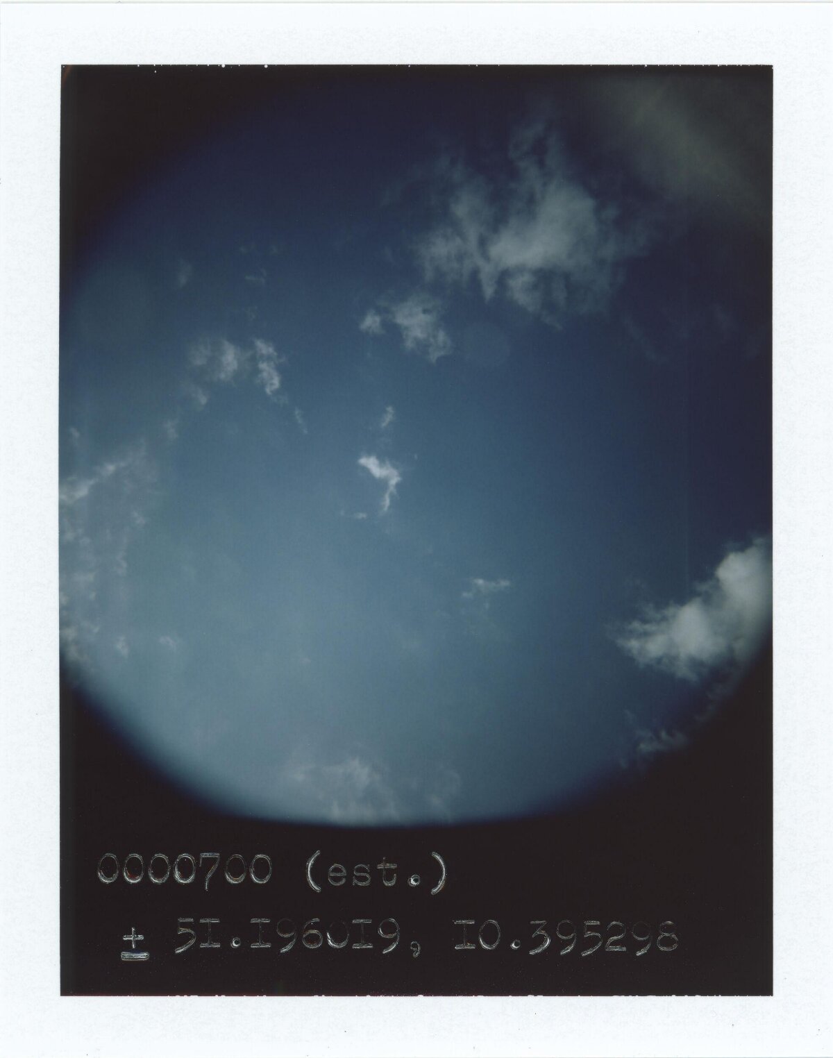 Polaroid Shot of Blue Sky with Clouds
