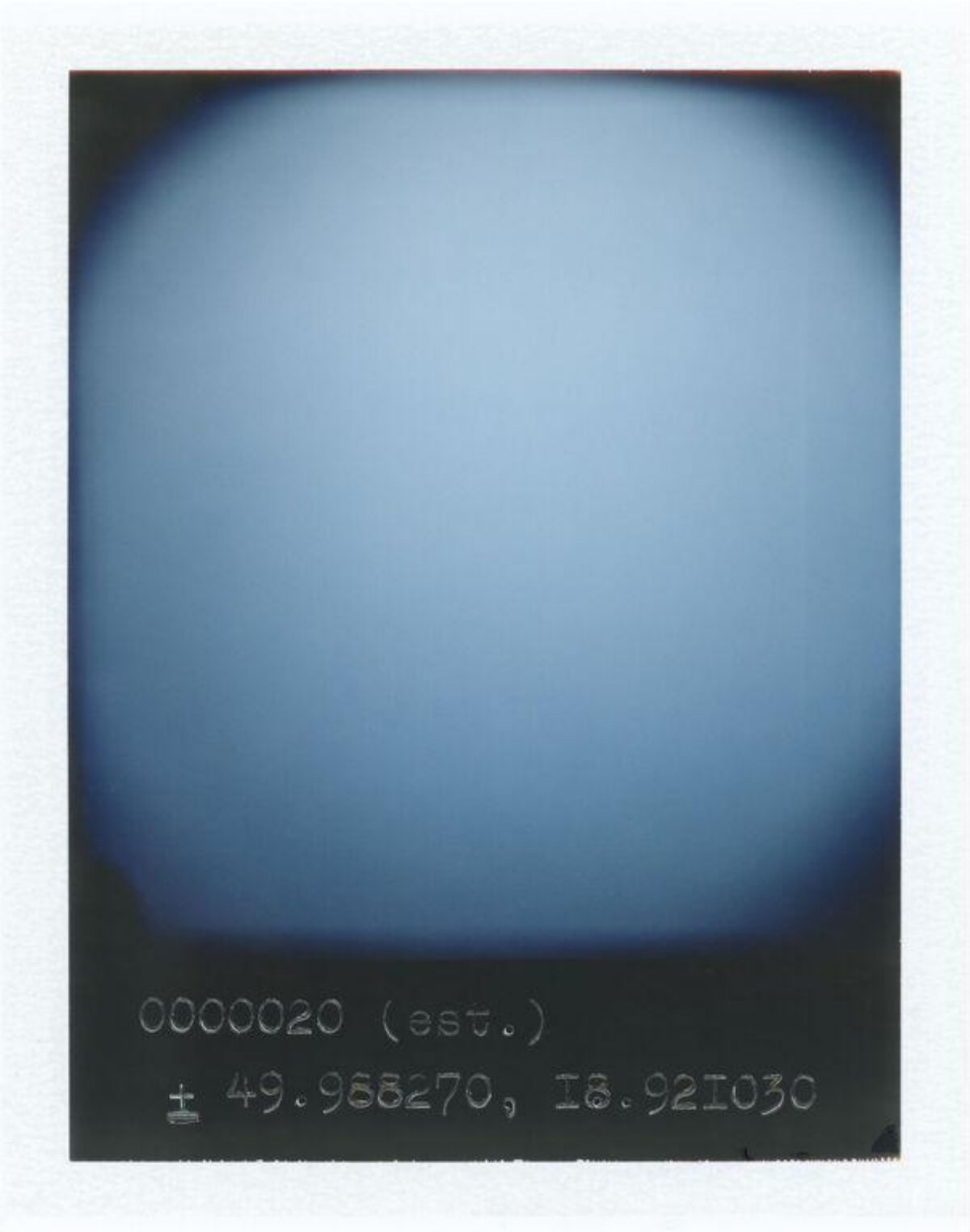 Polaroid With Handwritten Coordinates