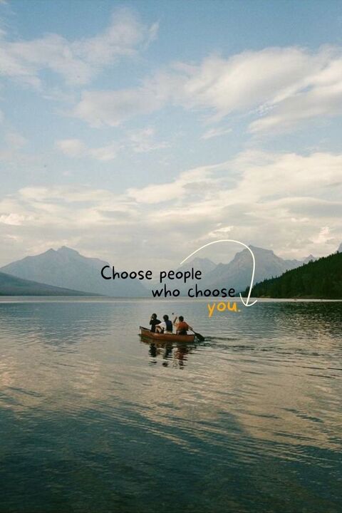 Canoe on Lake with Motivational Quote