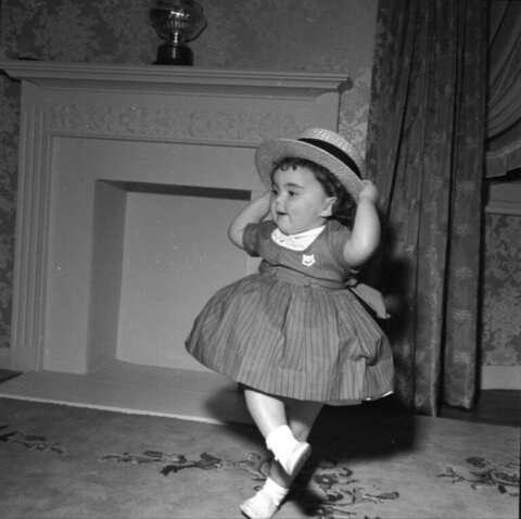 Toddler Dancing in Vintage Indoor Setting