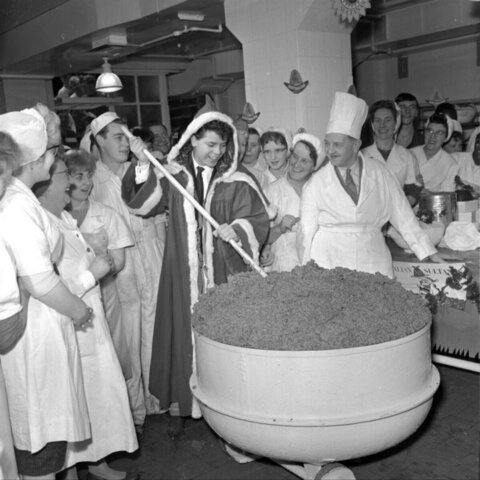 Santa Stirring Giant Christmas Pudding