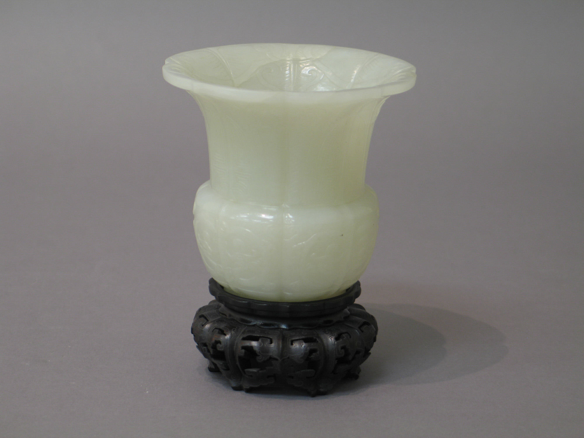 White Jade Carved Vase on Wooden Base