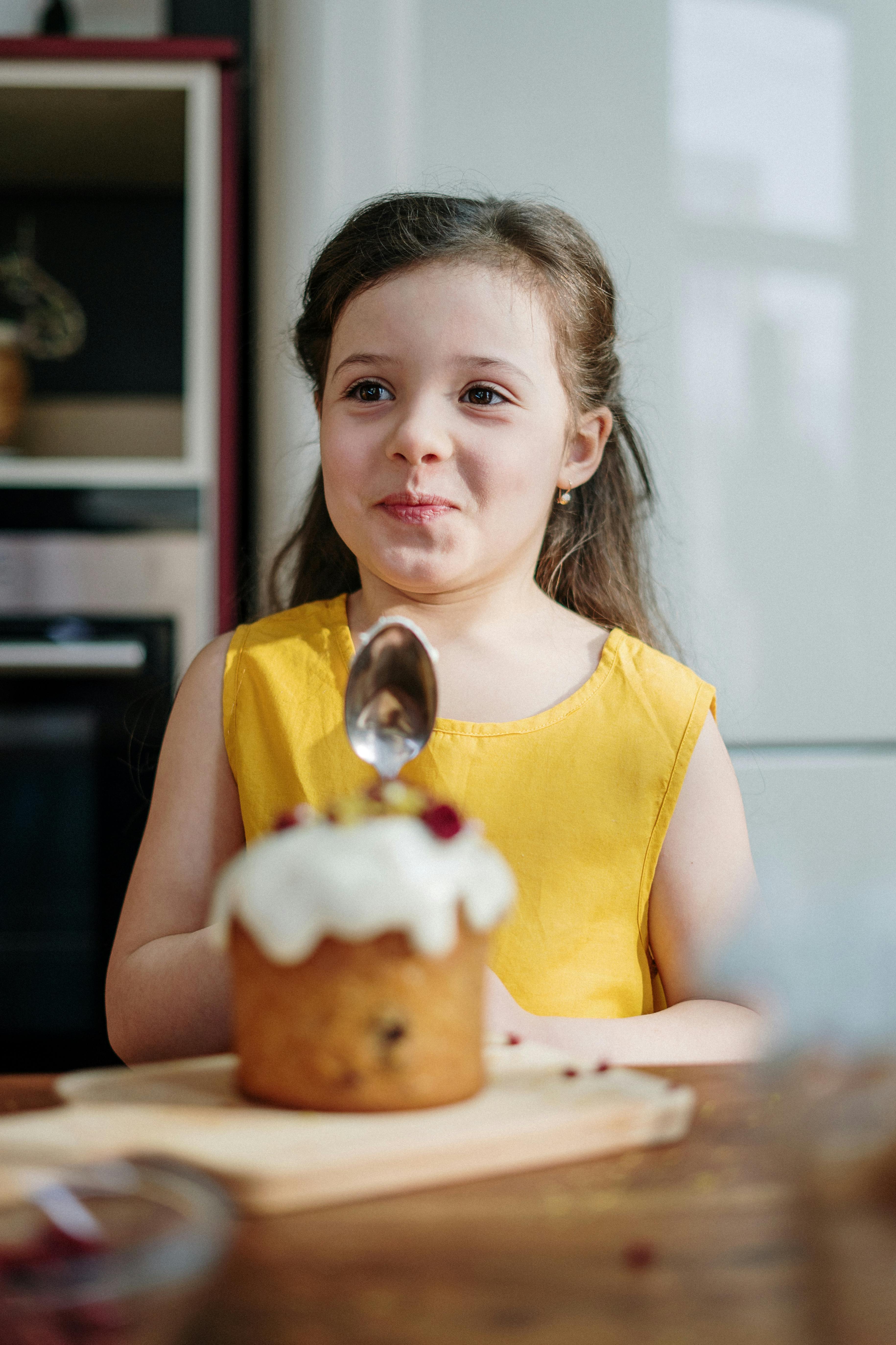 Little Girl With Decorated Cake