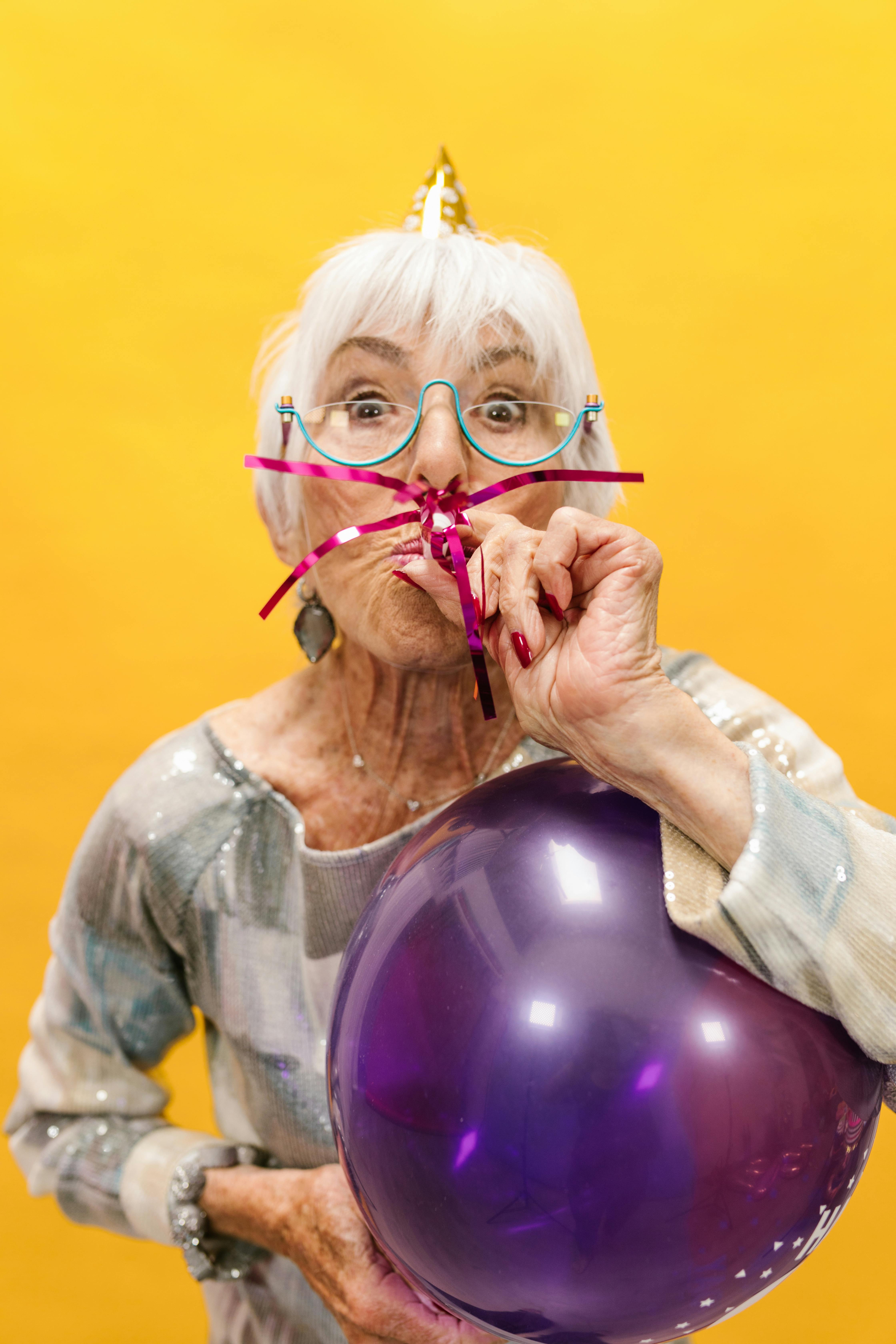 Elderly Woman Celebrating Birthday Party