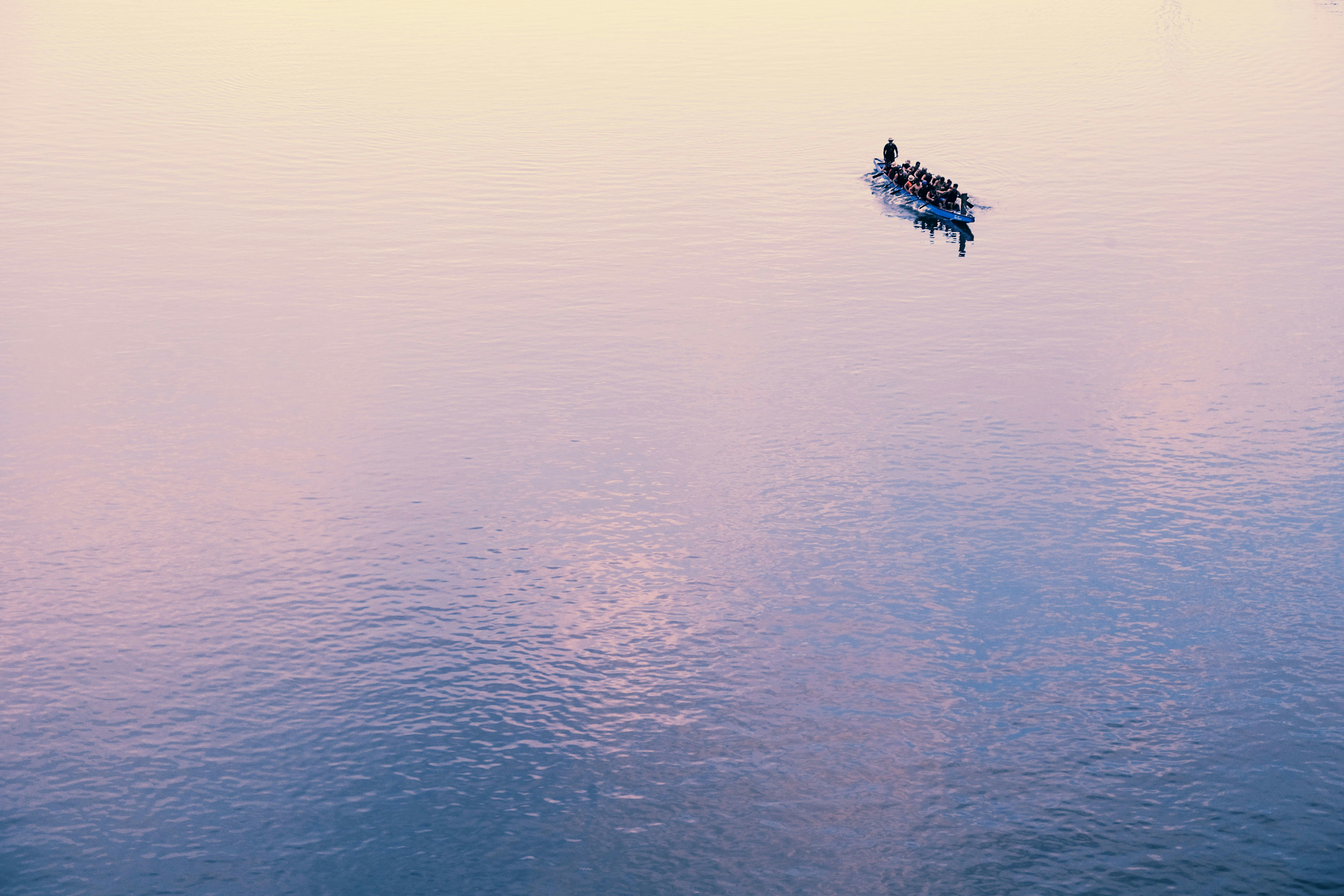 Rowing Team on Calm Water